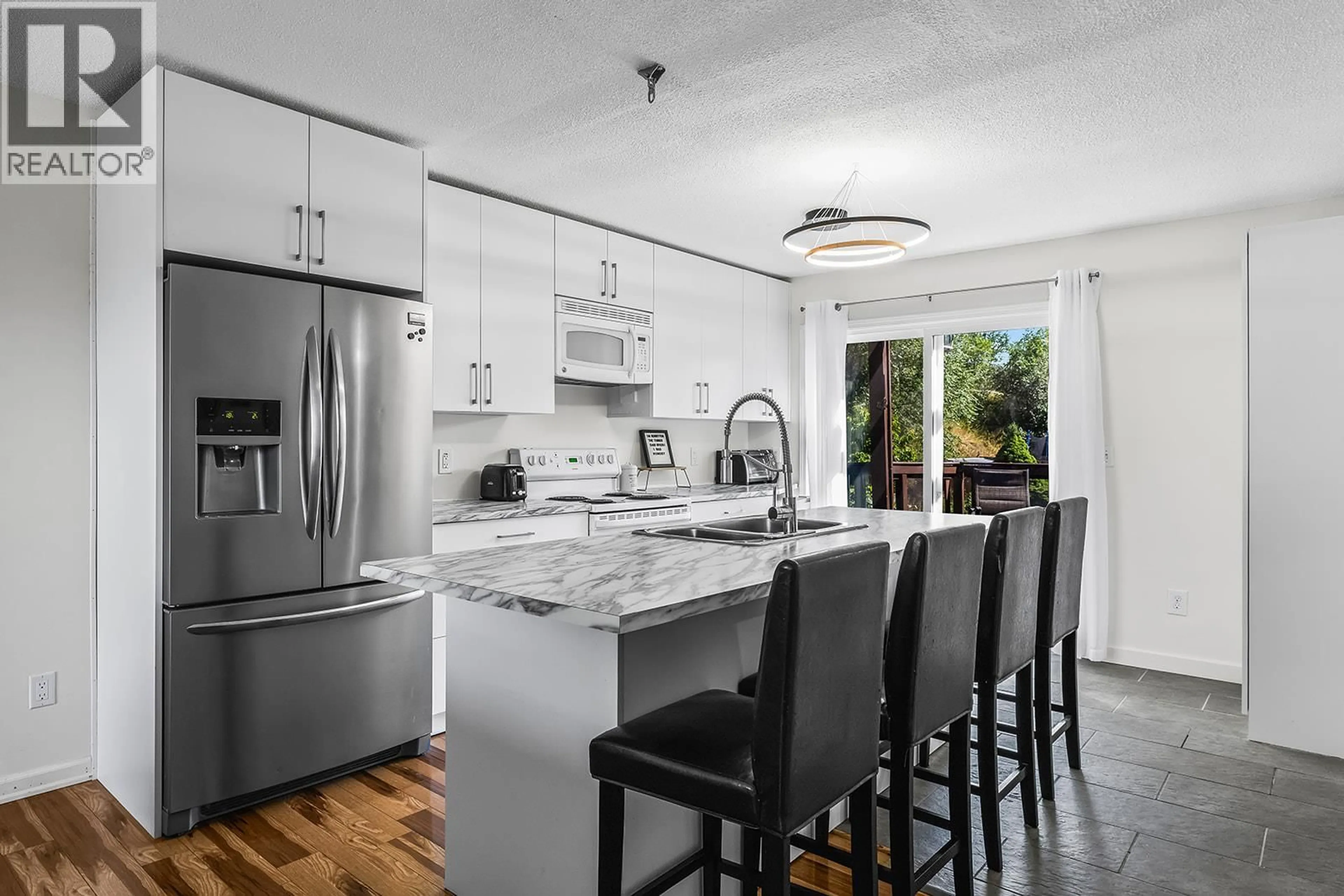 Open concept kitchen, ceramic/tile floor for 675 WEBSTER ROAD, Kelowna British Columbia V1X4V6