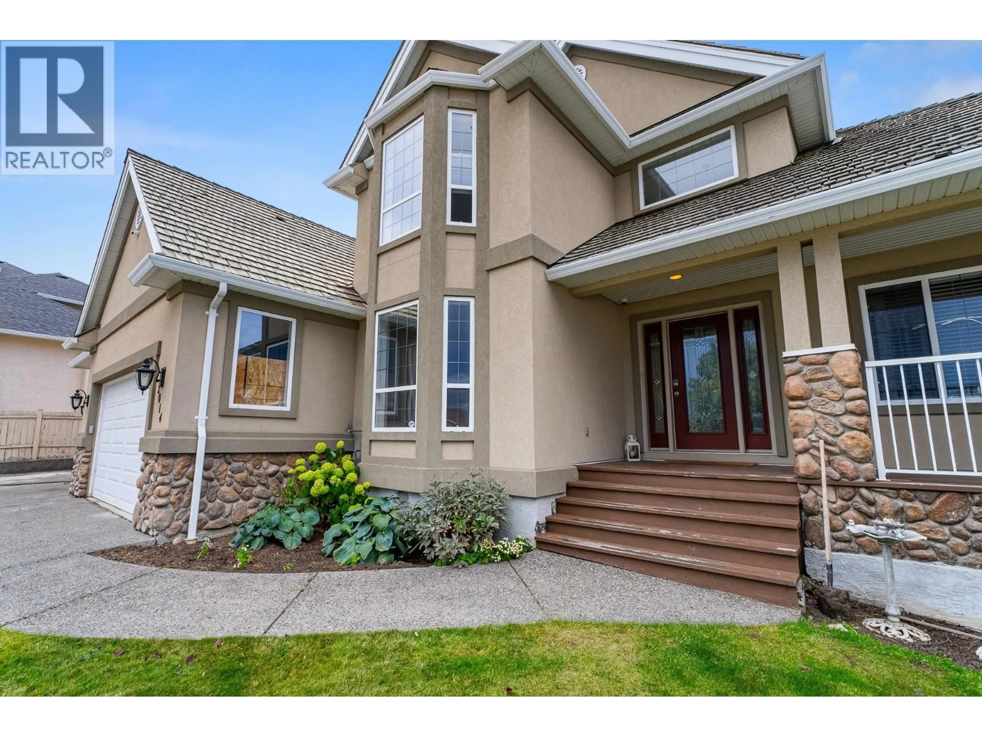 Home with vinyl exterior material, street for 2014 MUIRFIELD ROAD, Kamloops British Columbia V1S1S6