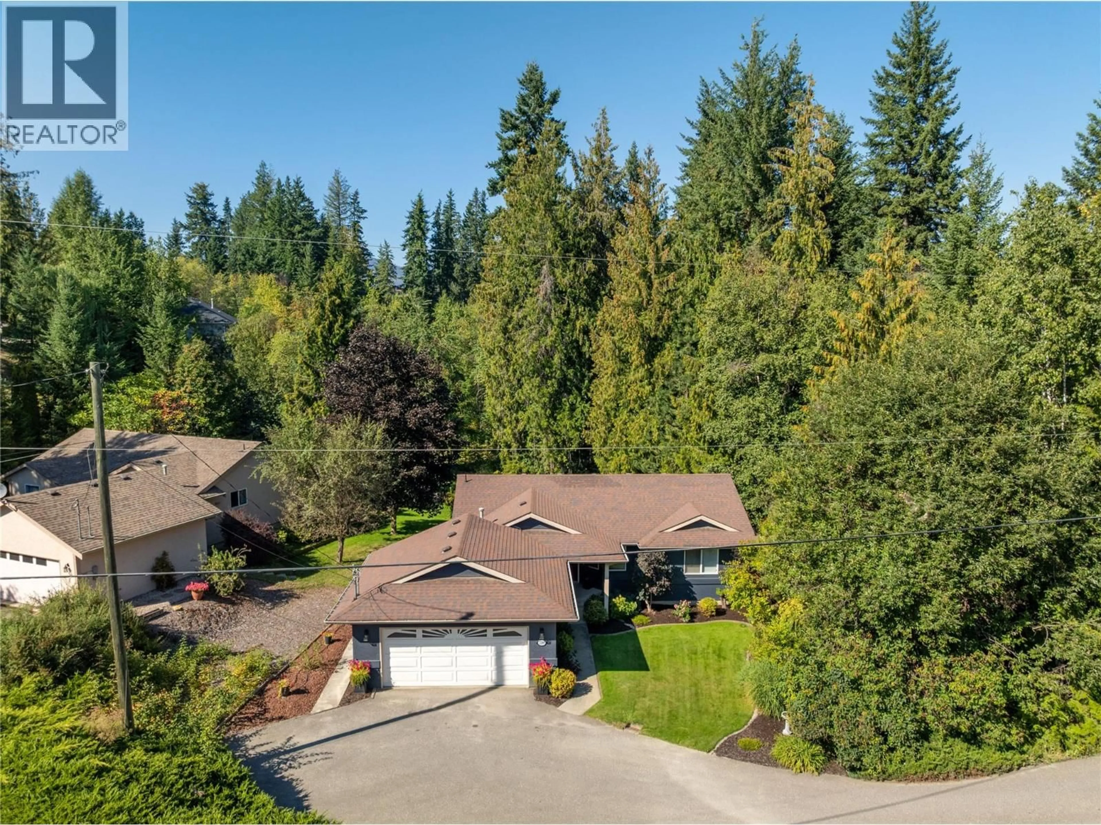 A pic from outside/outdoor area/front of a property/back of a property/a pic from drone, forest/trees view for 2289 TA LANA TRAIL, Sorrento British Columbia V0E2W2