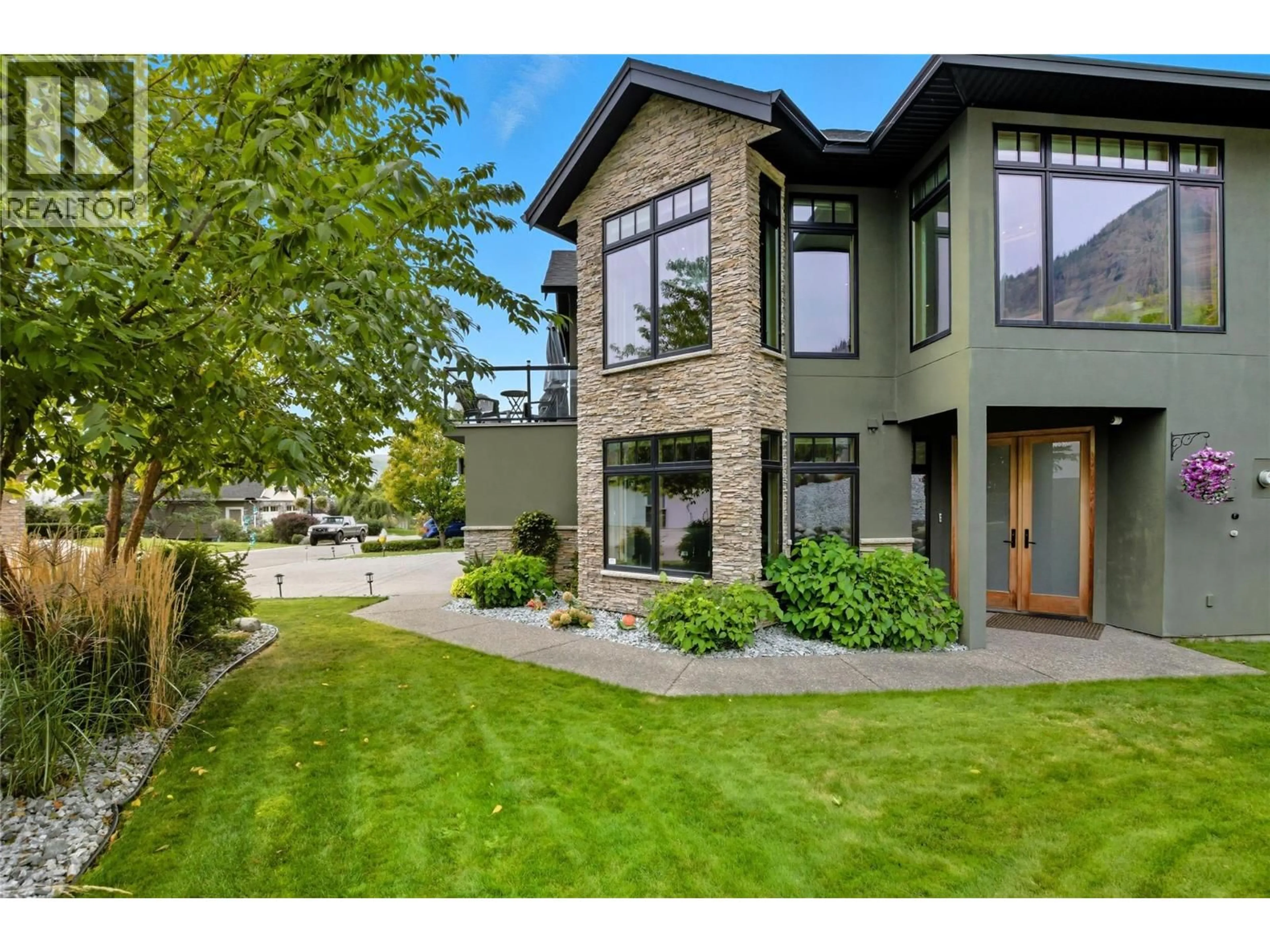 Home with brick exterior material, street for 1200 CANYON RIDGE PLACE, Kamloops British Columbia V2H0A1