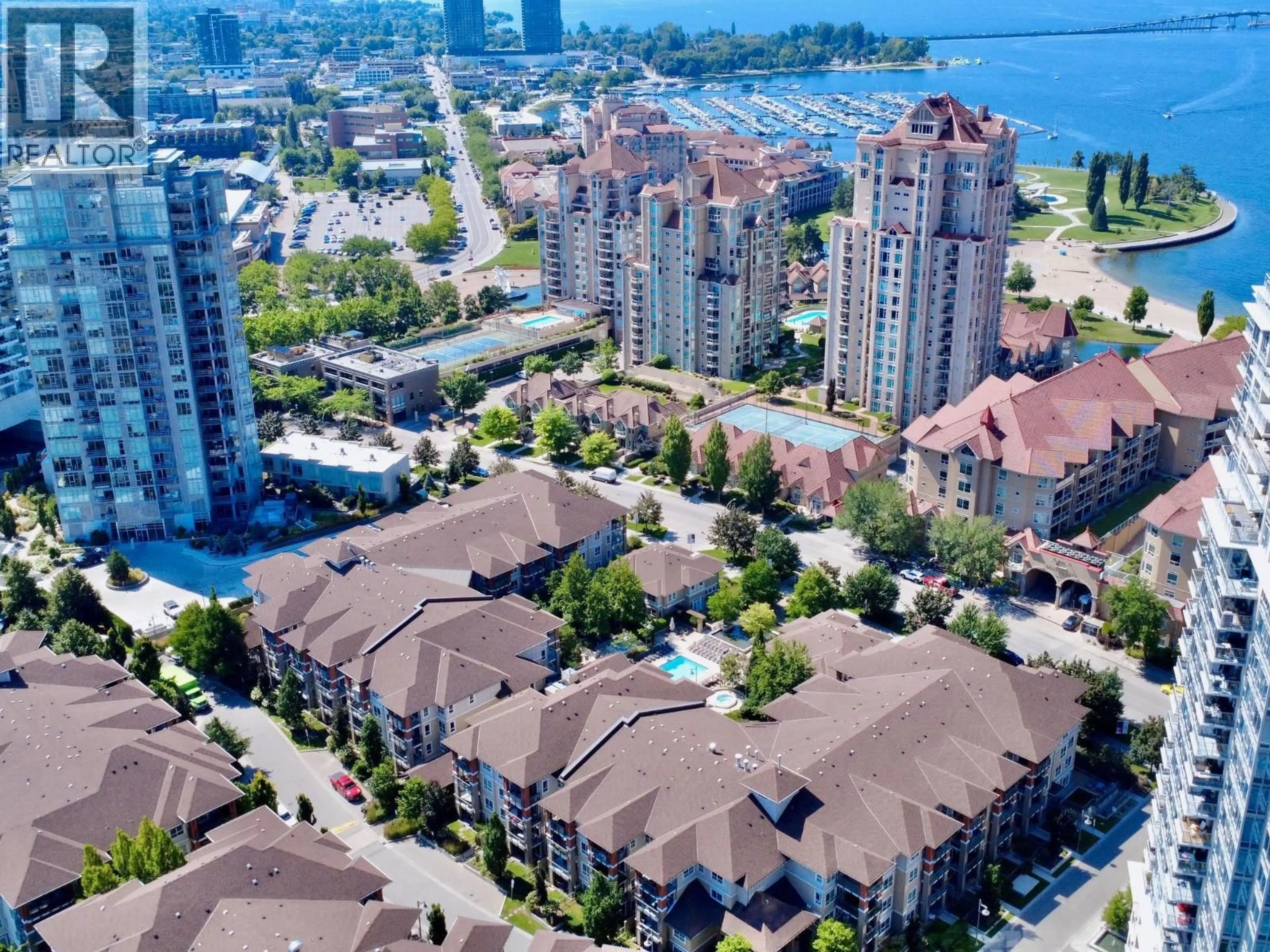 A pic from outside/outdoor area/front of a property/back of a property/a pic from drone, city buildings view from balcony for 105 - 1093 SUNSET DRIVE, Kelowna British Columbia V1Y9Z4