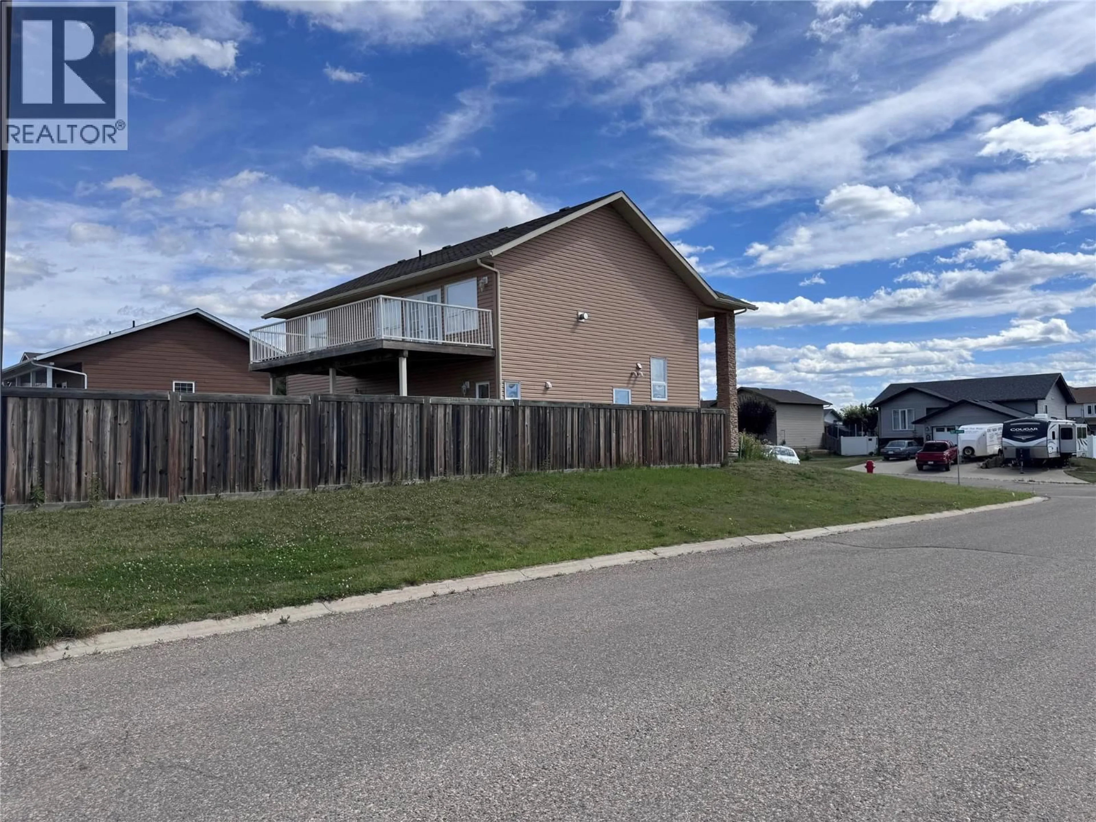 A pic from outside/outdoor area/front of a property/back of a property/a pic from drone, street for 1844 87 AVENUE, Dawson Creek British Columbia V1G0B5