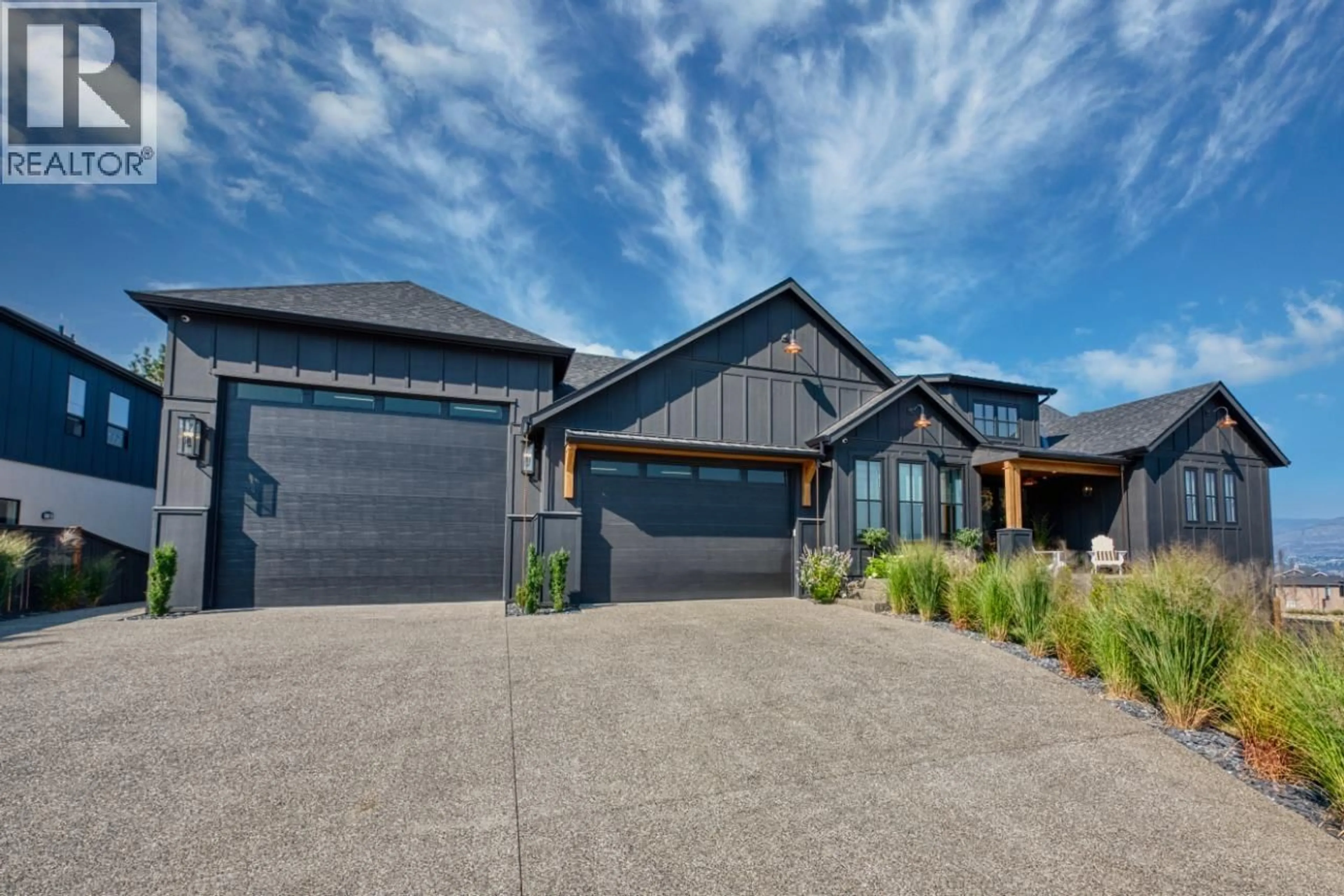 Home with brick exterior material, street for 652 TRUMPETER ROAD, Kelowna British Columbia V1W4L6