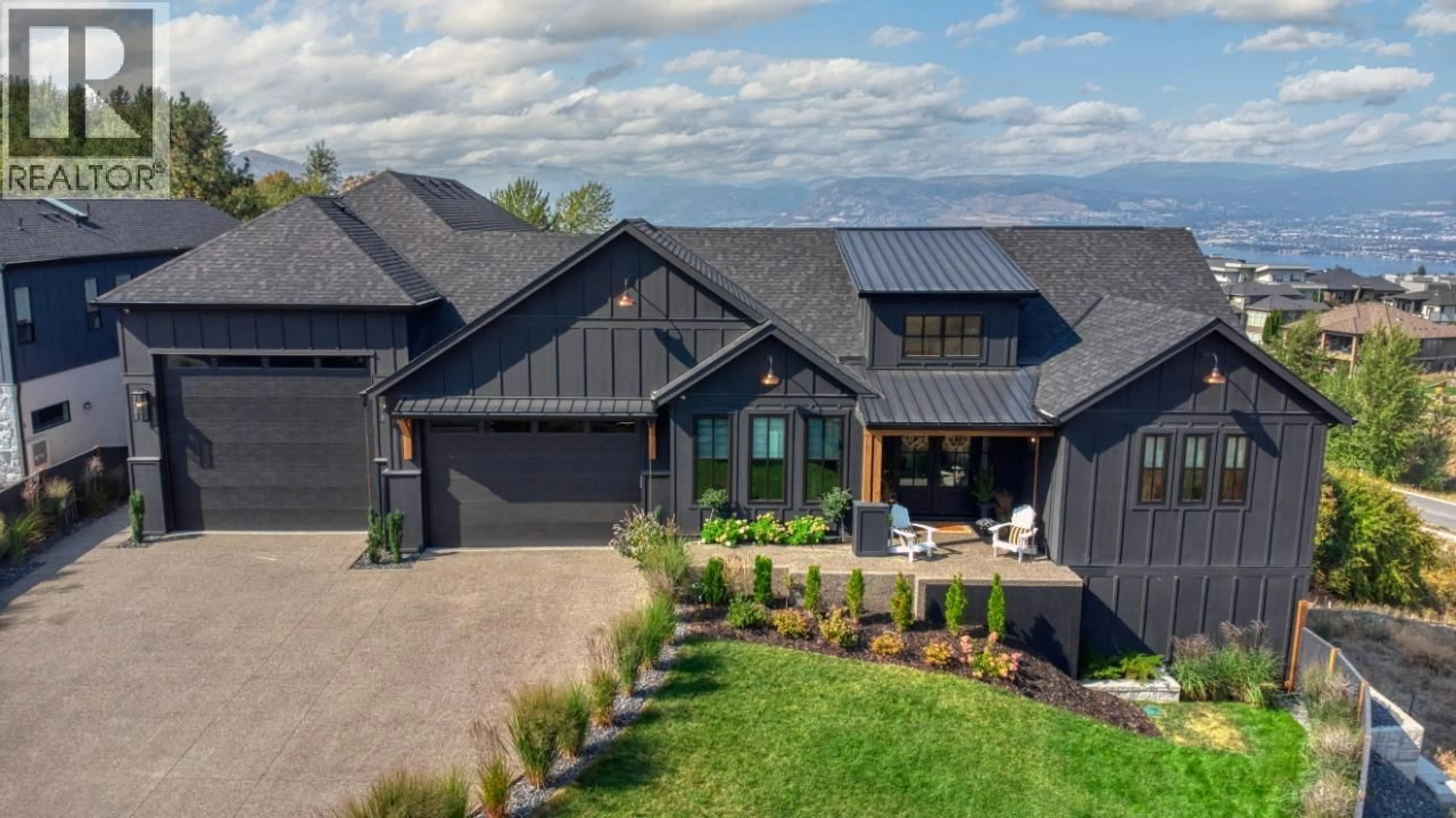 Home with brick exterior material, mountain view for 652 TRUMPETER ROAD, Kelowna British Columbia V1W4L6