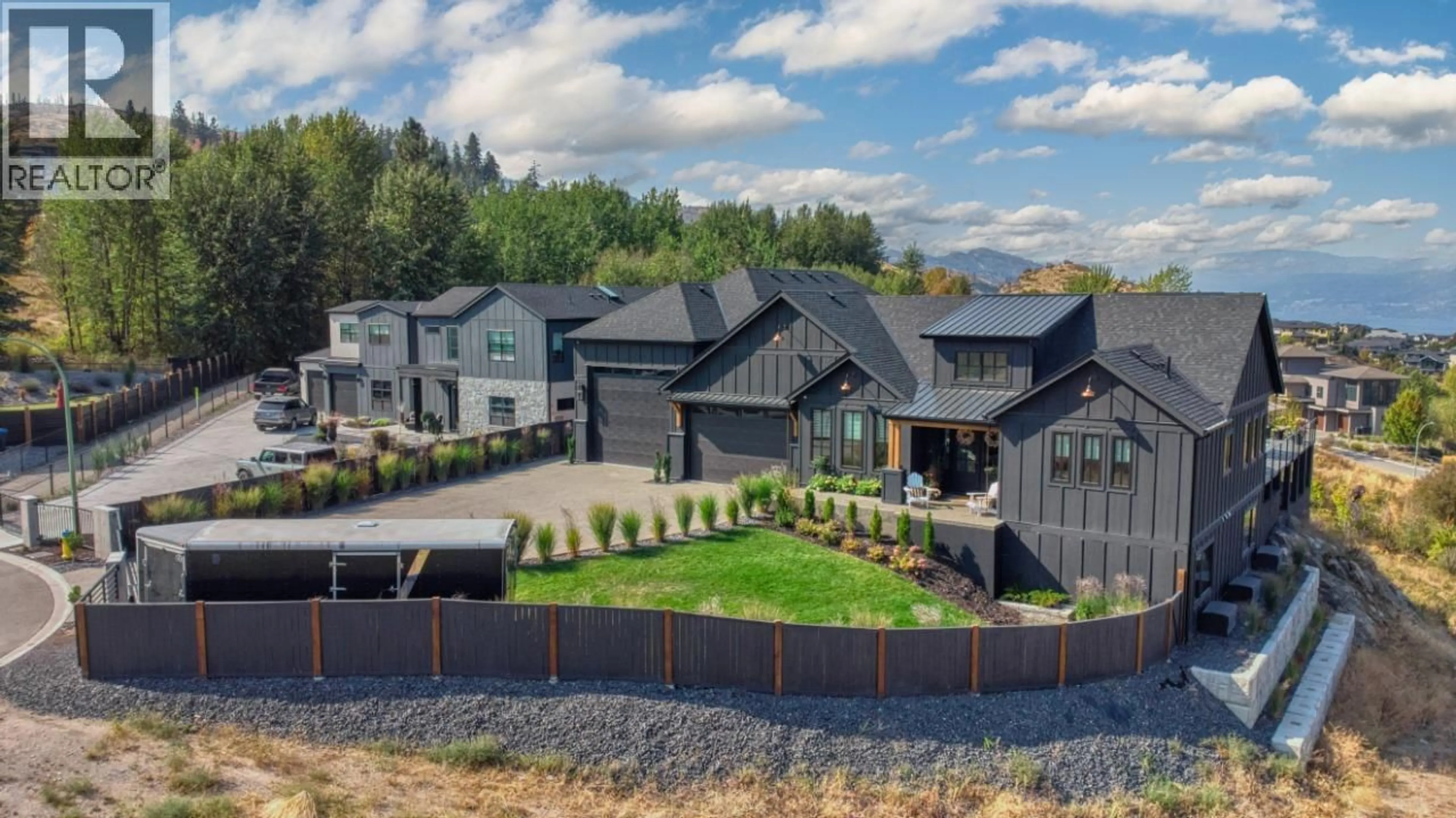 A pic from outside/outdoor area/front of a property/back of a property/a pic from drone, mountain view for 652 TRUMPETER ROAD, Kelowna British Columbia V1W4L6