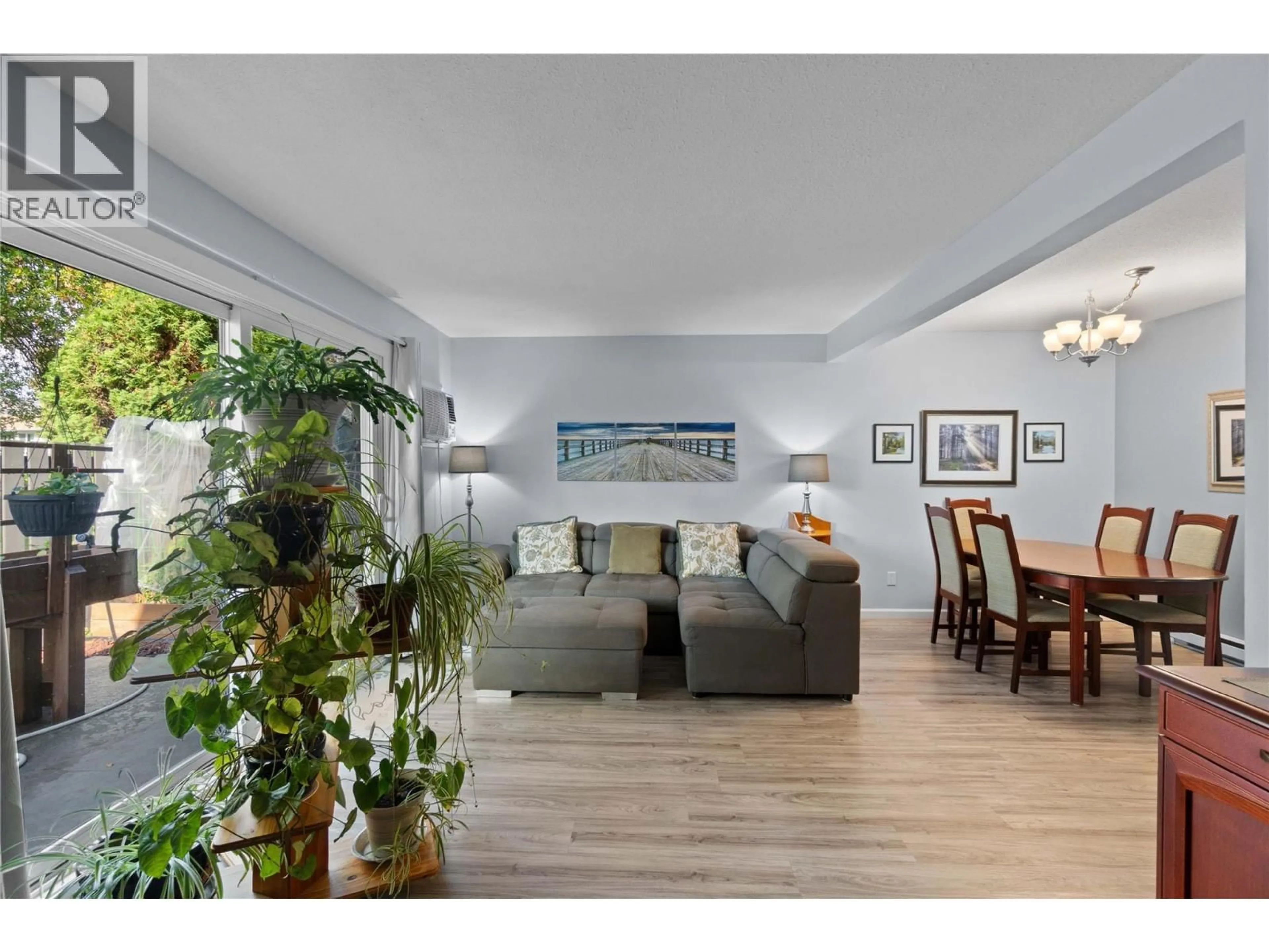 Living room with furniture, wood/laminate floor for 12 - 1809 40 AVENUE, Vernon British Columbia V1T7X4