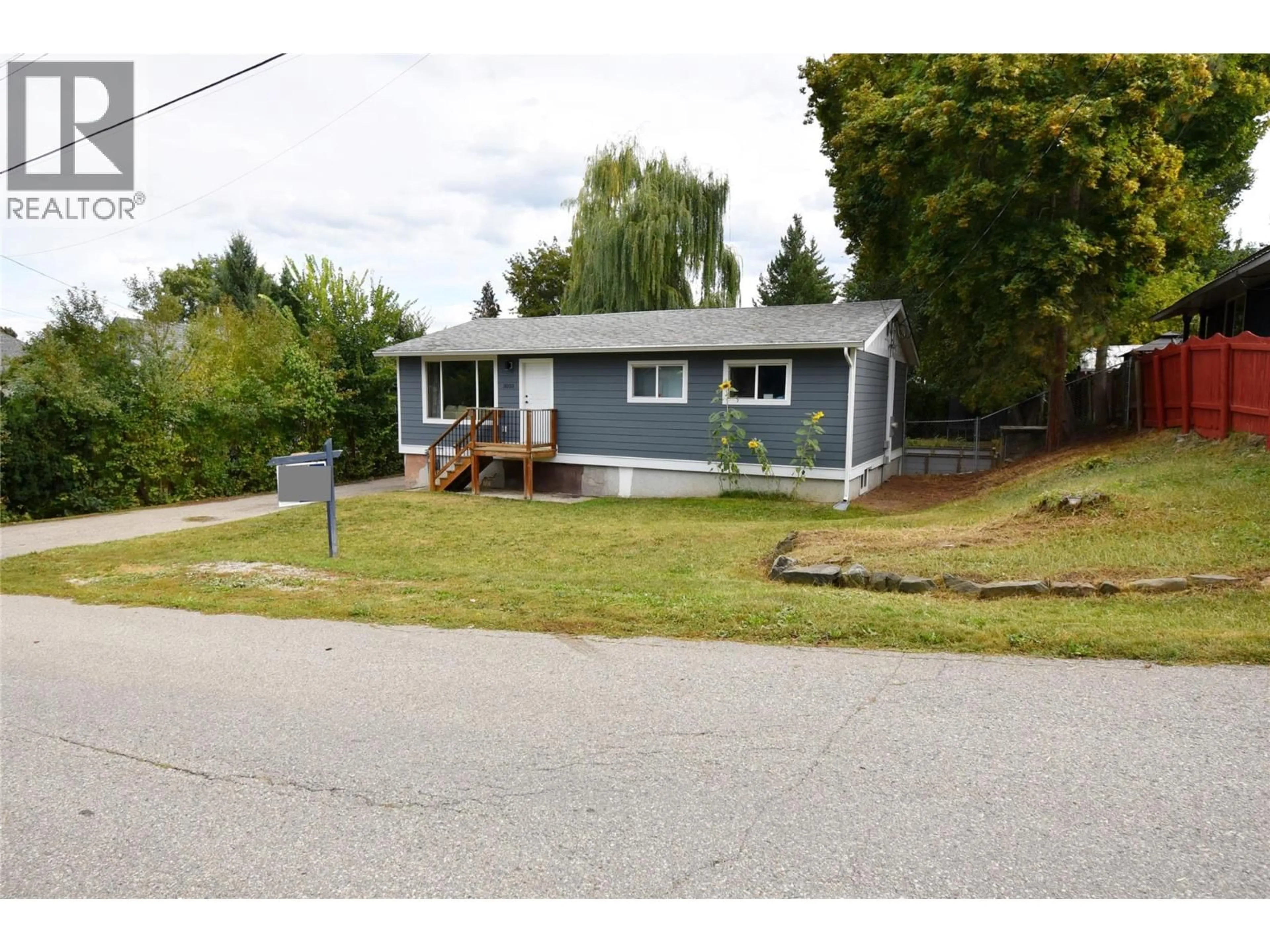 Home with vinyl exterior material, street for 3050 MORAY STREET, Armstrong British Columbia V0E1B1