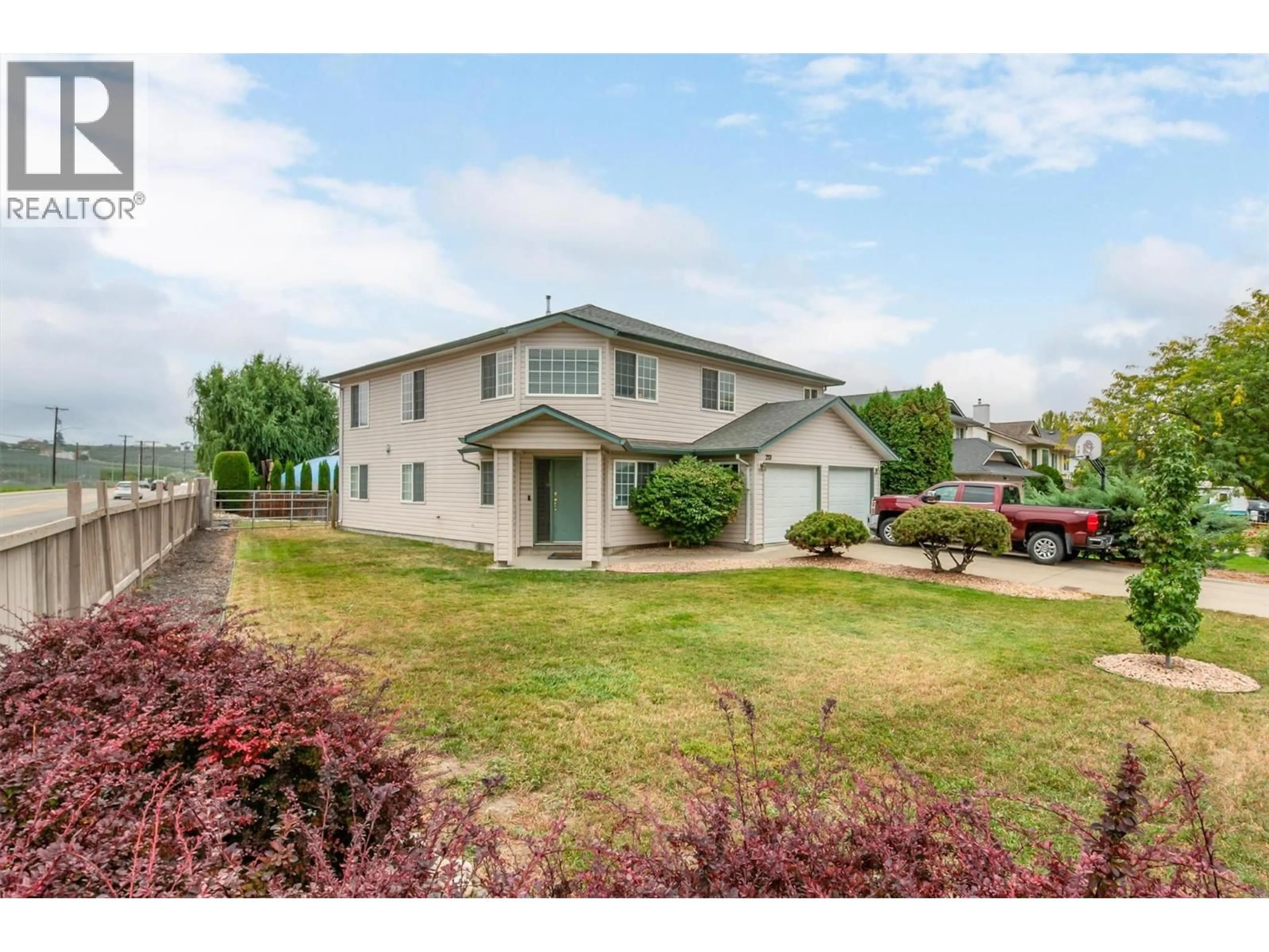 A pic from outside/outdoor area/front of a property/back of a property/a pic from drone, street for 213 DRYSDALE BOULEVARD, Kelowna British Columbia V1V1X1