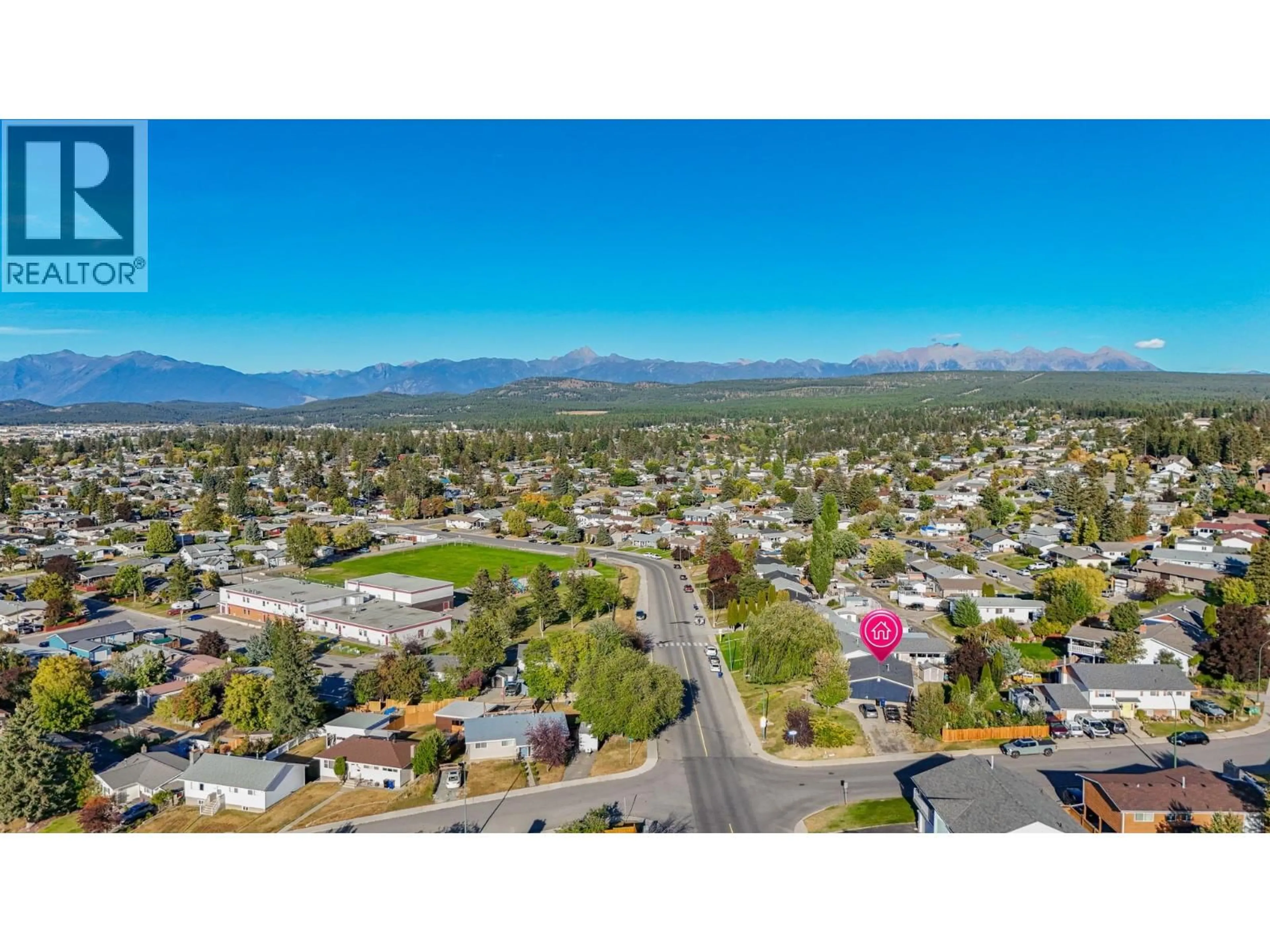 A pic from outside/outdoor area/front of a property/back of a property/a pic from drone, mountain view for 1312 LARCH DRIVE SOUTH, Cranbrook British Columbia V1C2K2
