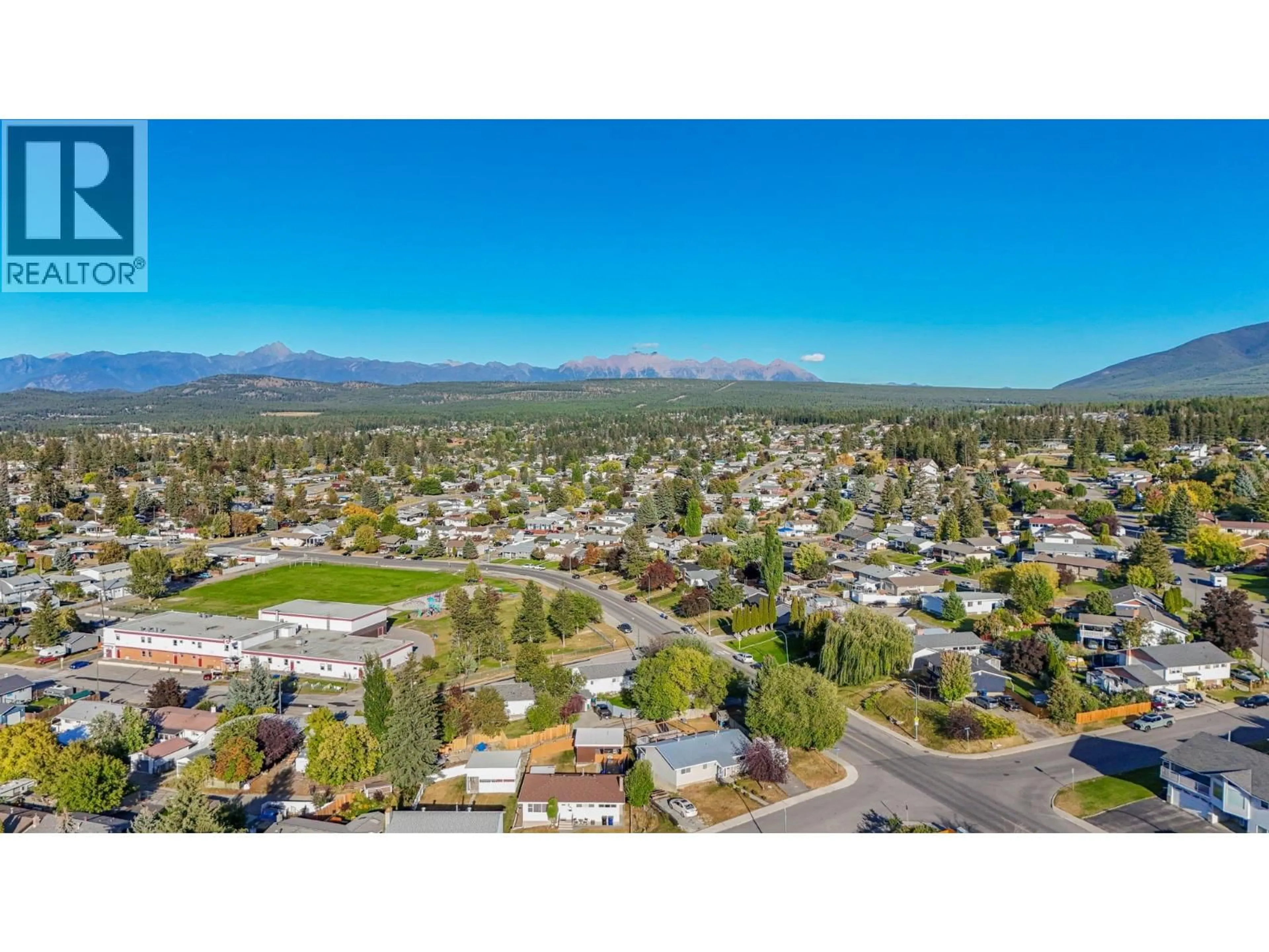 A pic from outside/outdoor area/front of a property/back of a property/a pic from drone, mountain view for 1312 LARCH DRIVE SOUTH, Cranbrook British Columbia V1C2K2