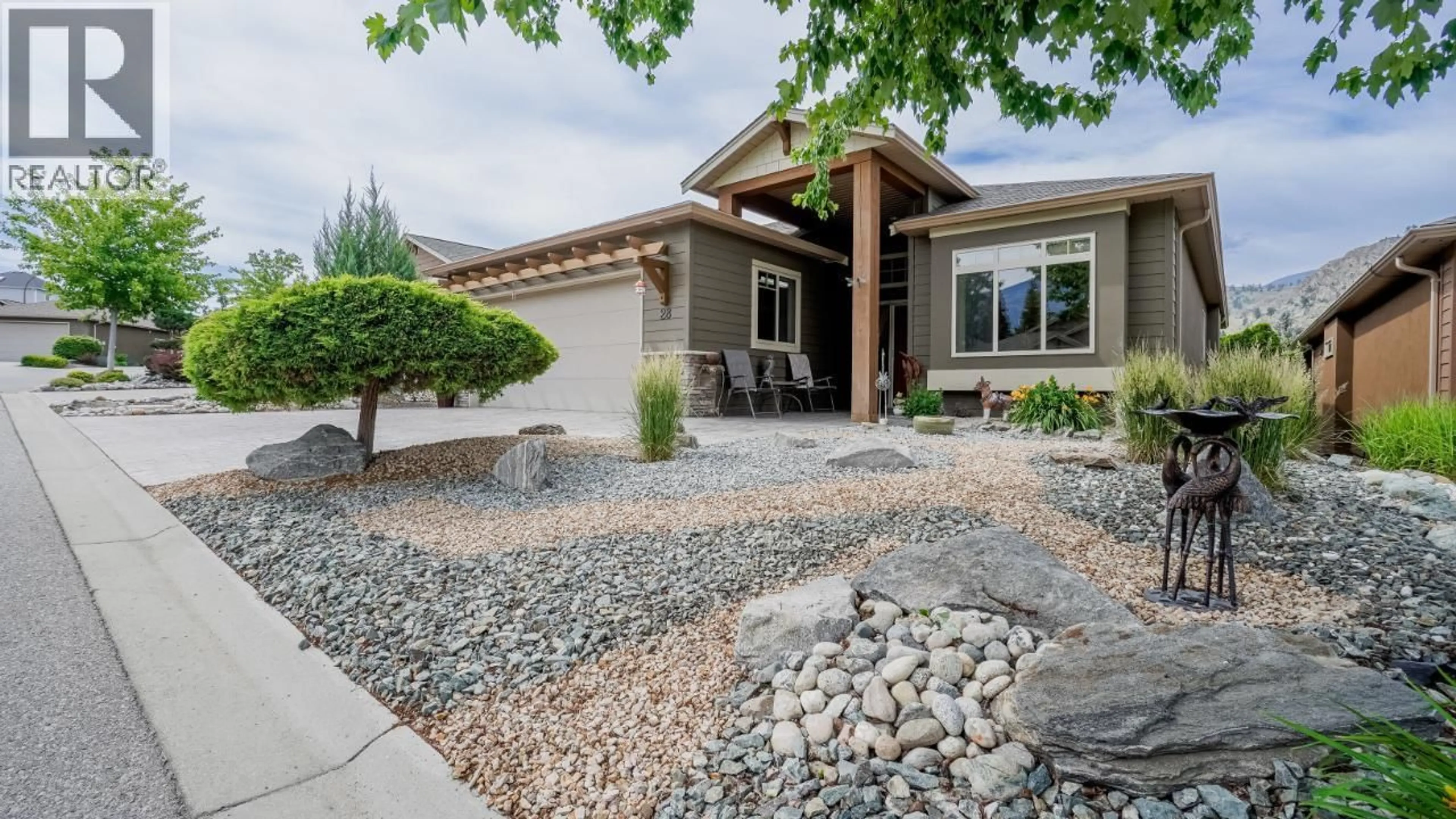 Home with vinyl exterior material, street for 28 - 6833 MEADOWS DRIVE, Oliver British Columbia V0H1T4