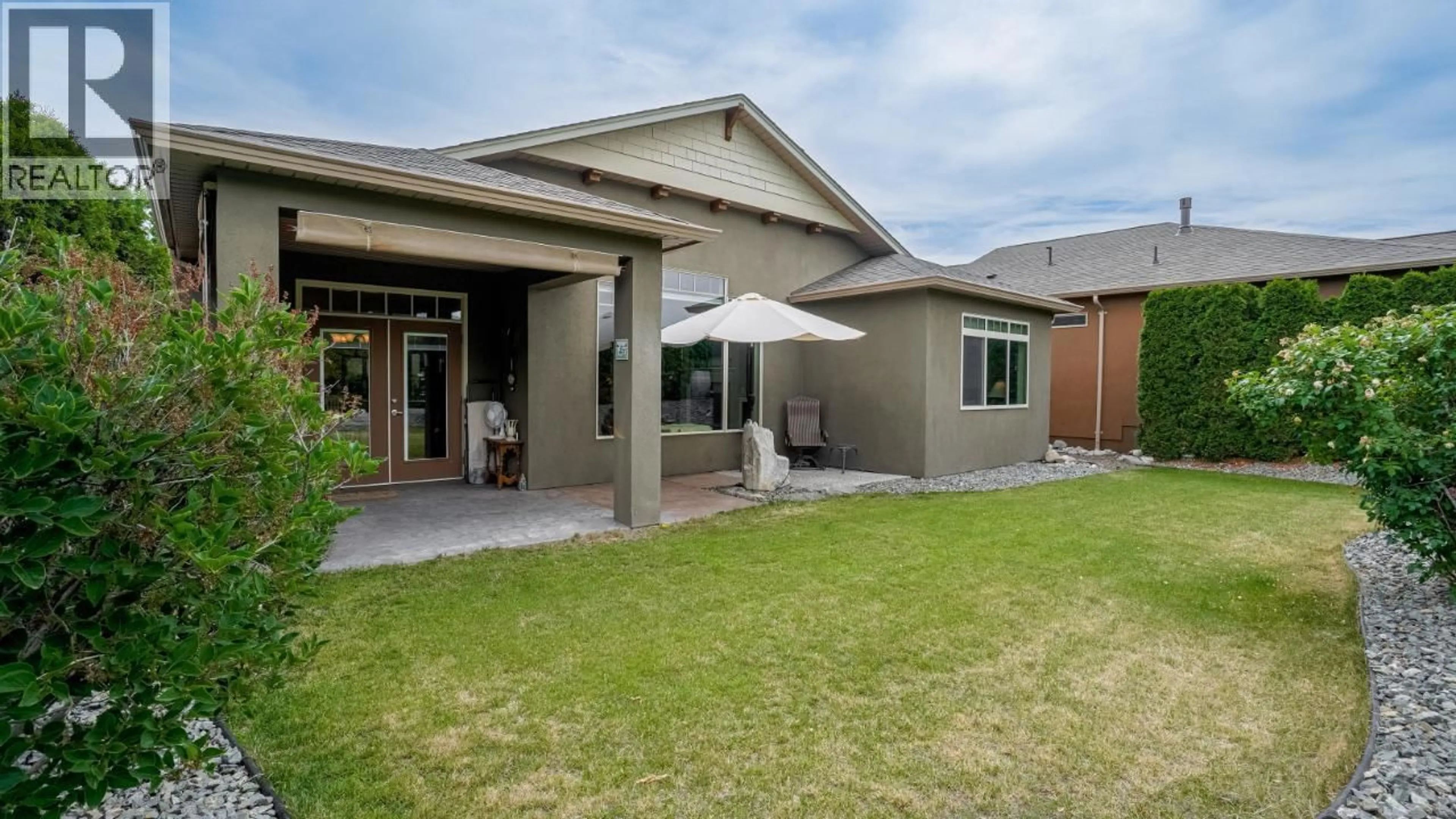Home with vinyl exterior material, street for 28 - 6833 MEADOWS DRIVE, Oliver British Columbia V0H1T4