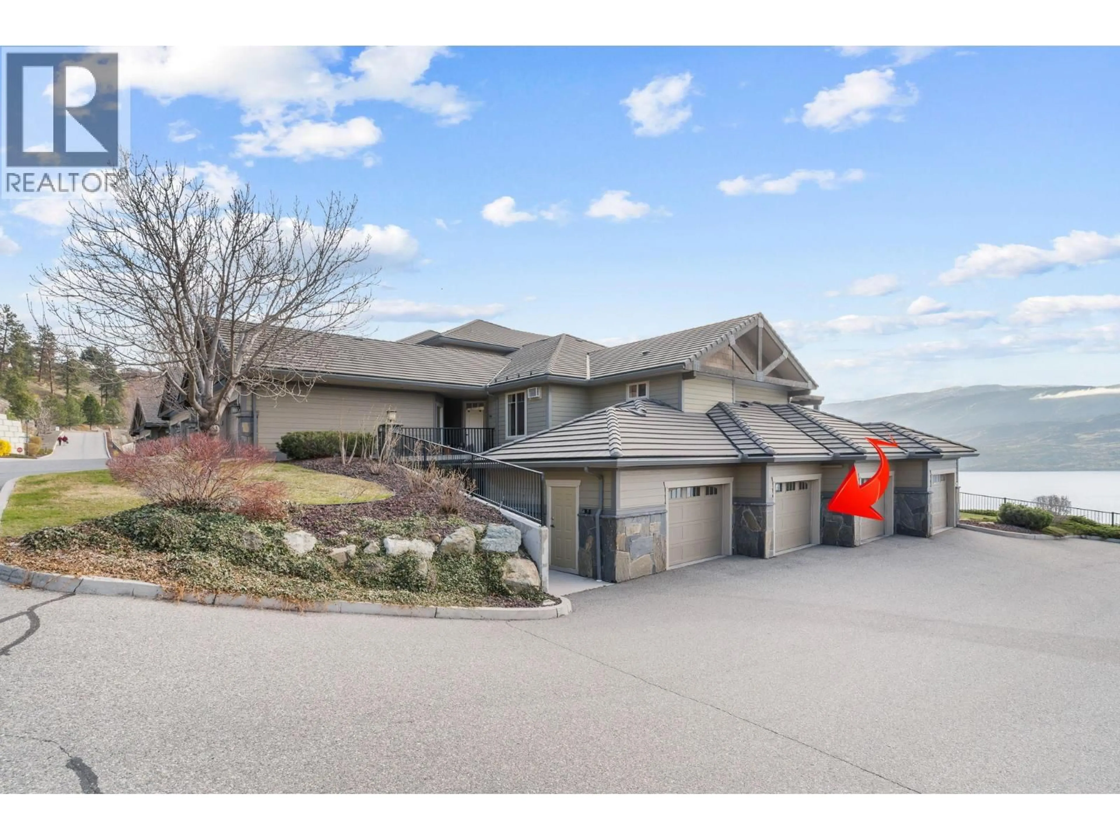 A pic from outside/outdoor area/front of a property/back of a property/a pic from drone, street for 108 - 4350 PONDEROSA DRIVE, Peachland British Columbia V0H1X5
