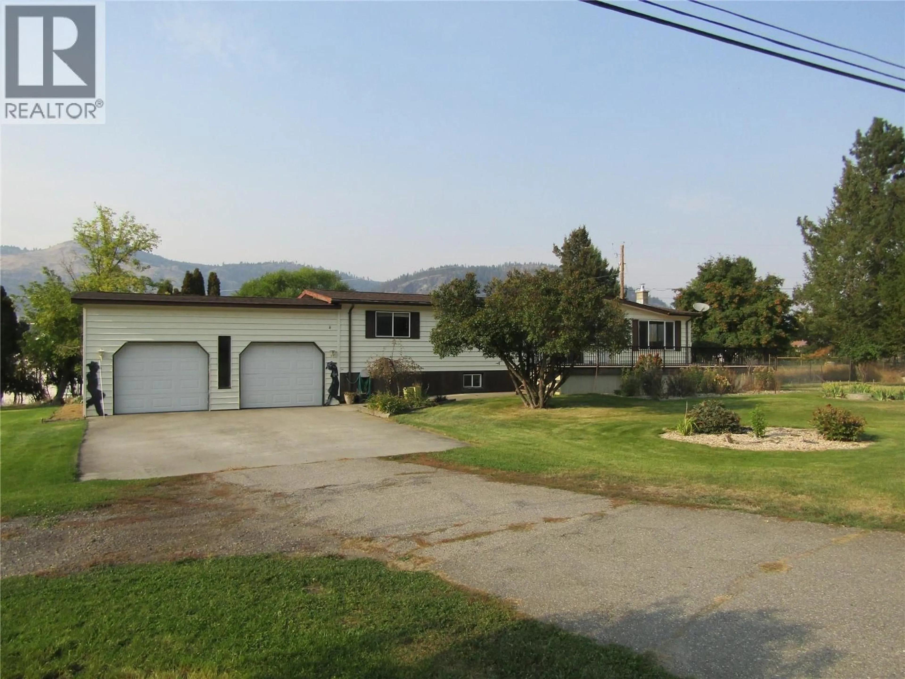 A pic from outside/outdoor area/front of a property/back of a property/a pic from drone, mountain view for 3575 CARSON ROAD, Grand Forks British Columbia V0H1H5