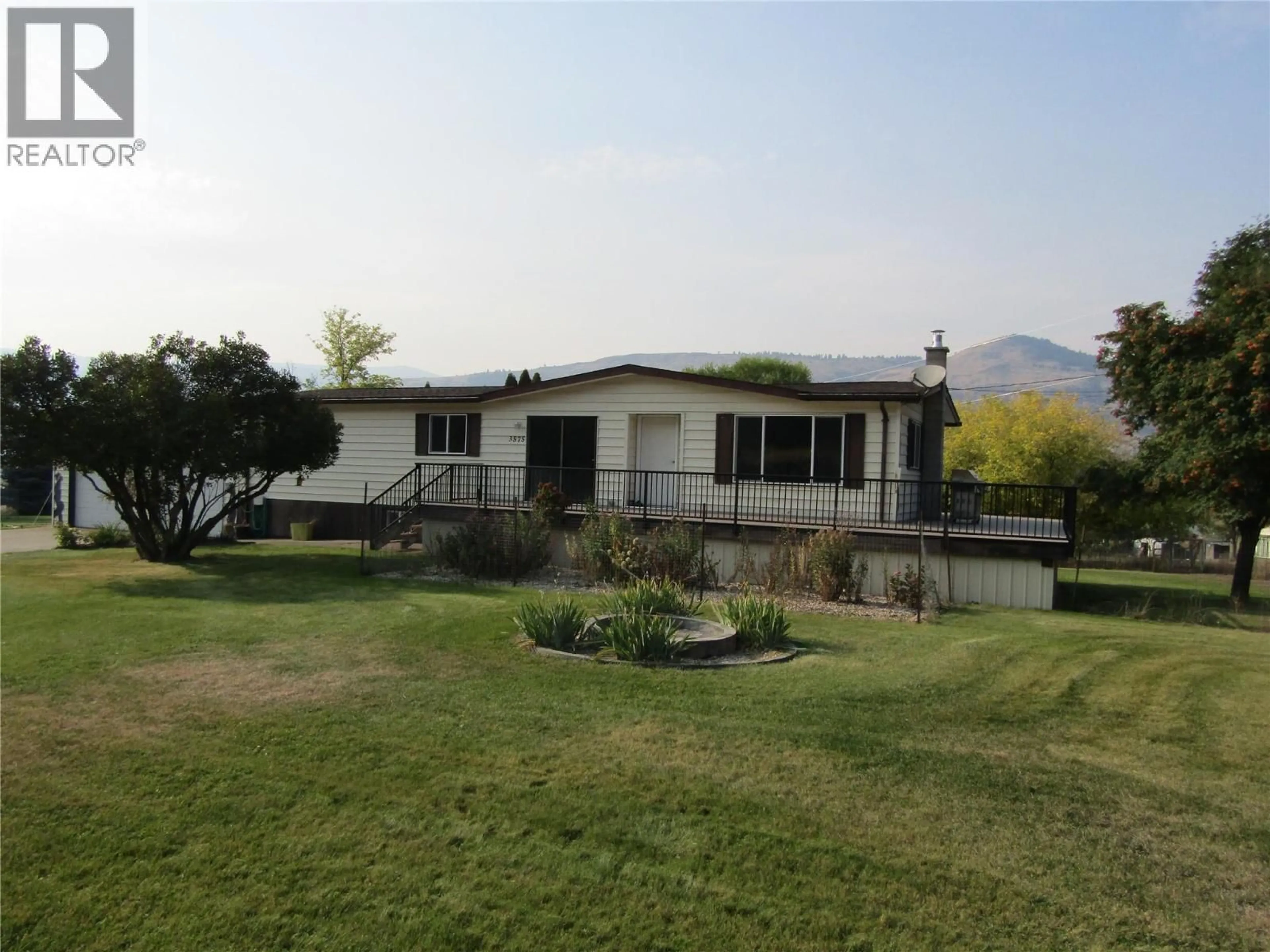 A pic from outside/outdoor area/front of a property/back of a property/a pic from drone, mountain view for 3575 CARSON ROAD, Grand Forks British Columbia V0H1H5