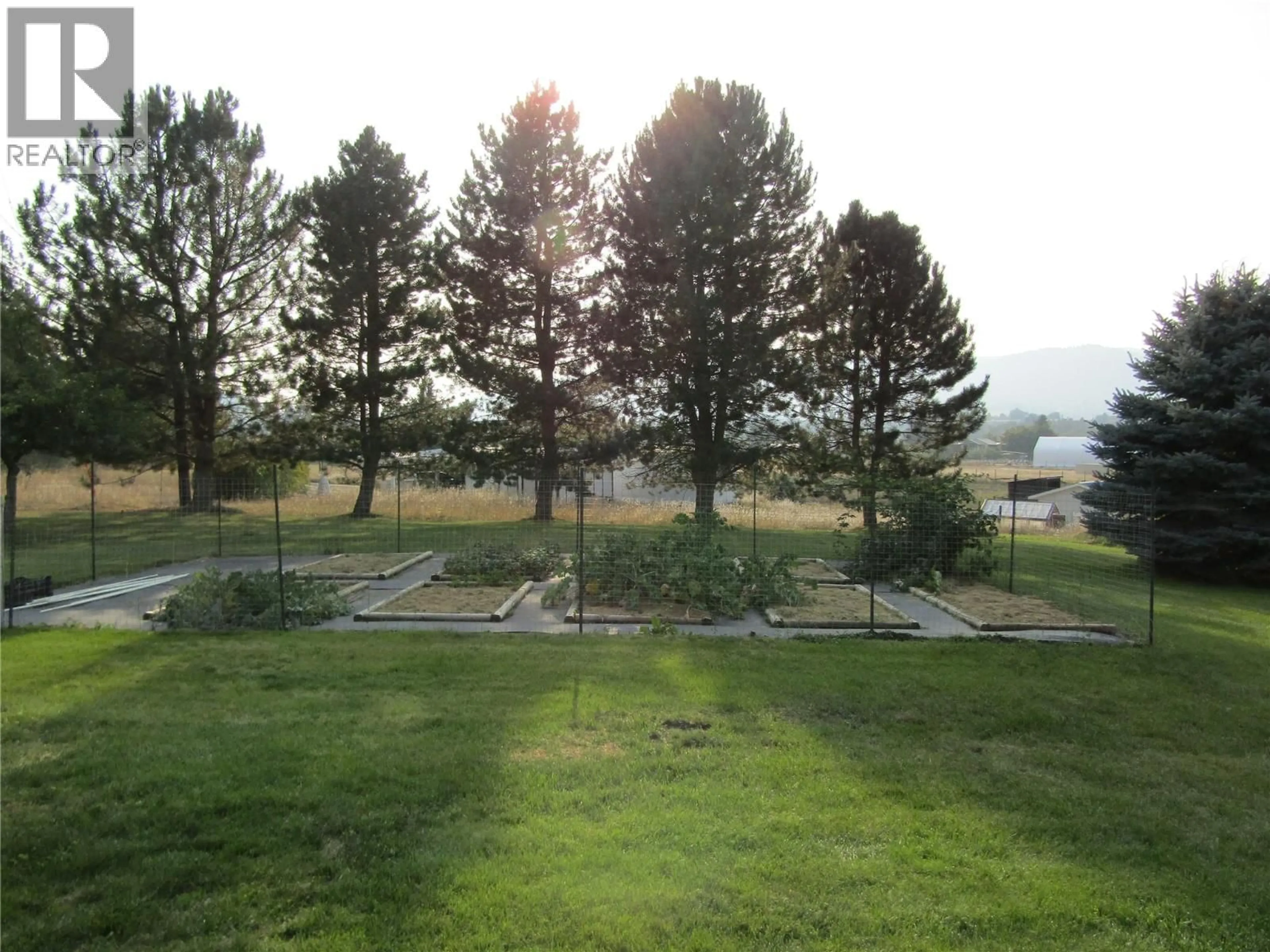 A pic from outside/outdoor area/front of a property/back of a property/a pic from drone, mountain view for 3575 CARSON ROAD, Grand Forks British Columbia V0H1H5