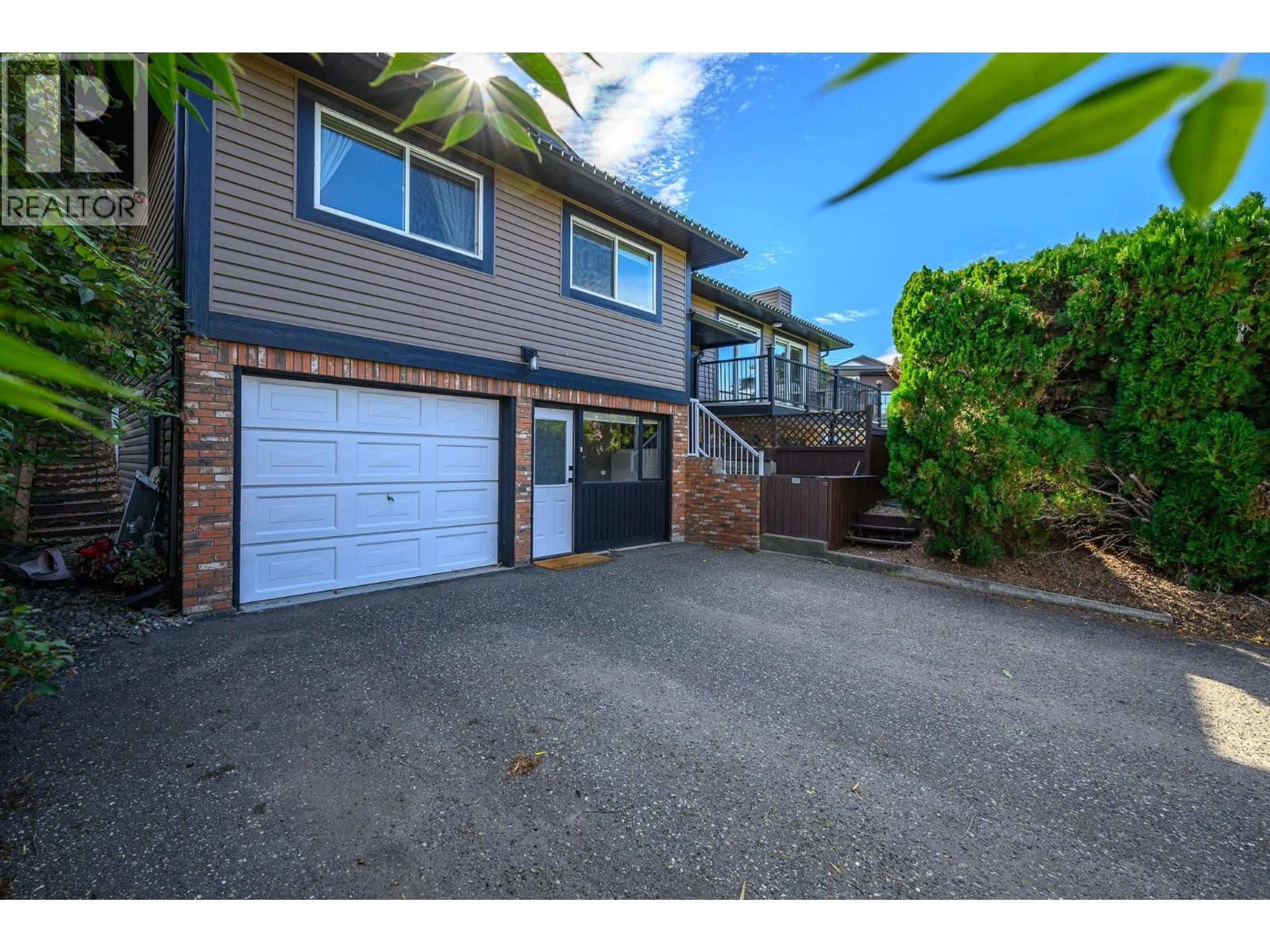 A pic from outside/outdoor area/front of a property/back of a property/a pic from drone, street for 7590 KLINGER ROAD, Vernon British Columbia V1H1H4