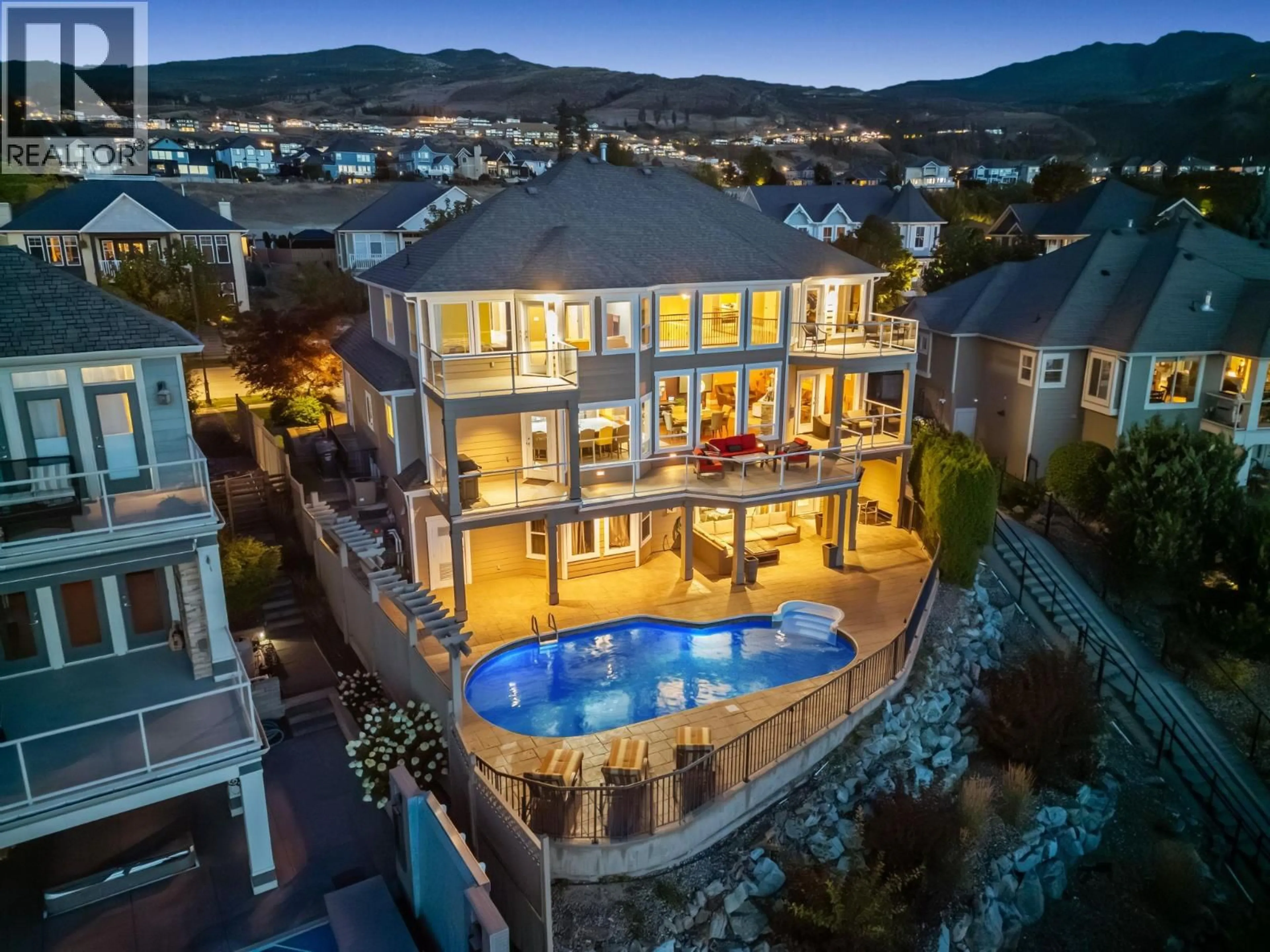 A pic from outside/outdoor area/front of a property/back of a property/a pic from drone, mountain view for 374 QUILCHENA ROAD, Kelowna British Columbia V1W4W4