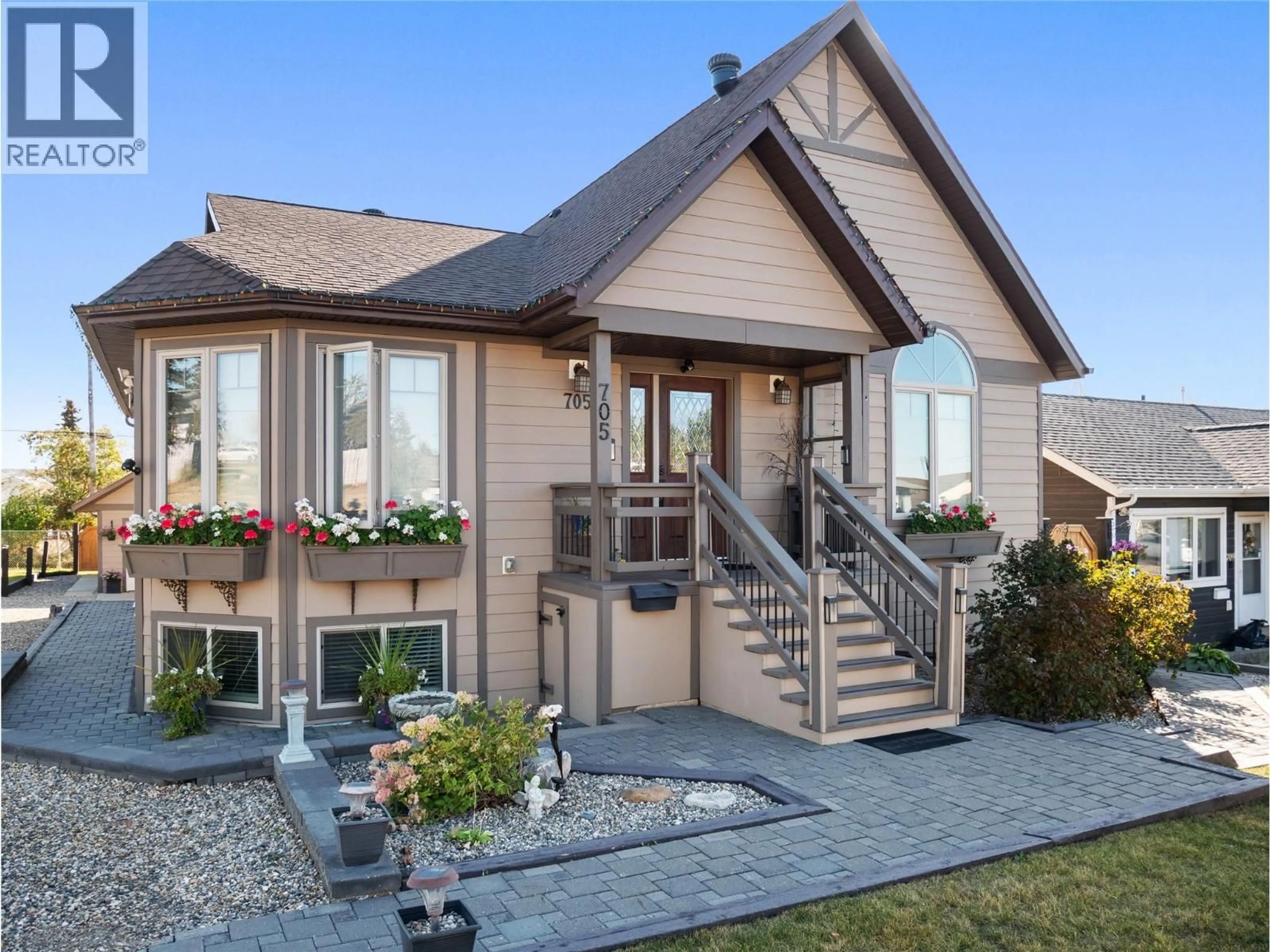 Home with brick exterior material, unknown for 705 97A AVENUE, Dawson Creek British Columbia V1G1R2
