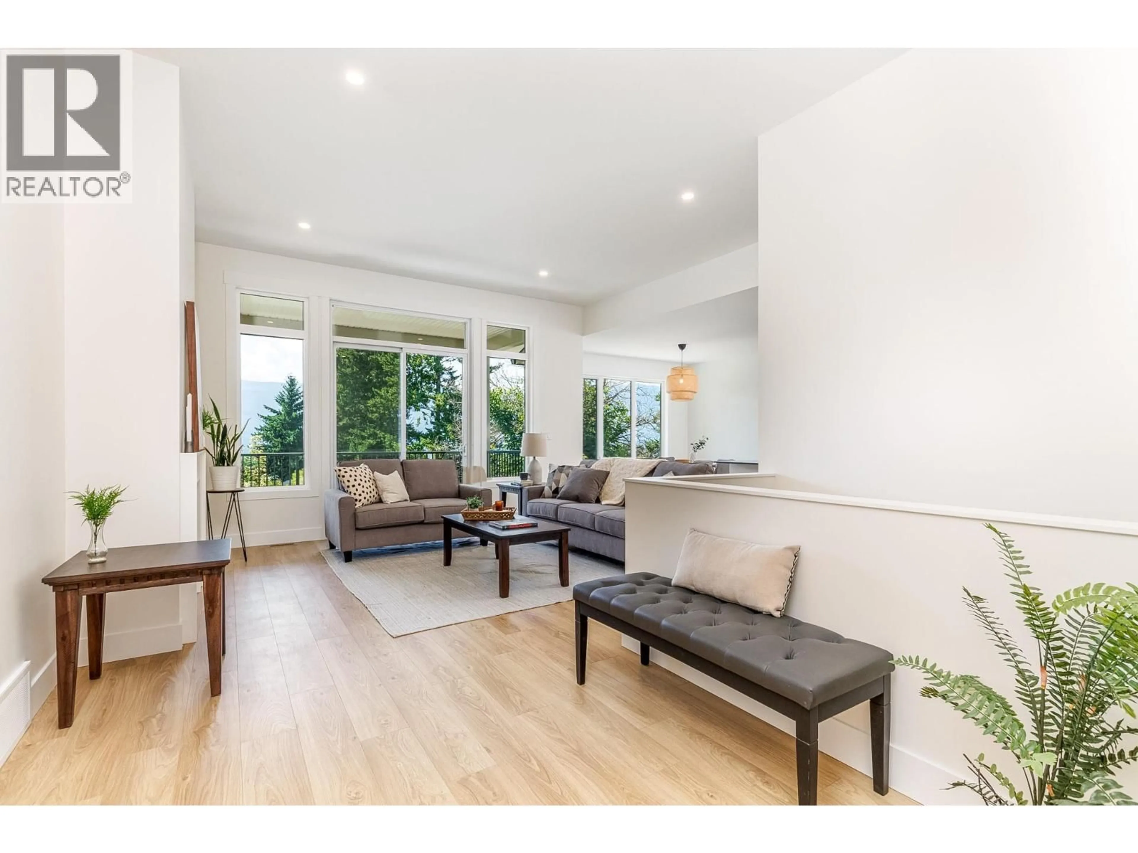Living room with furniture, wood/laminate floor for 111 20 STREET SOUTHEAST, Salmon Arm British Columbia V1E1T8