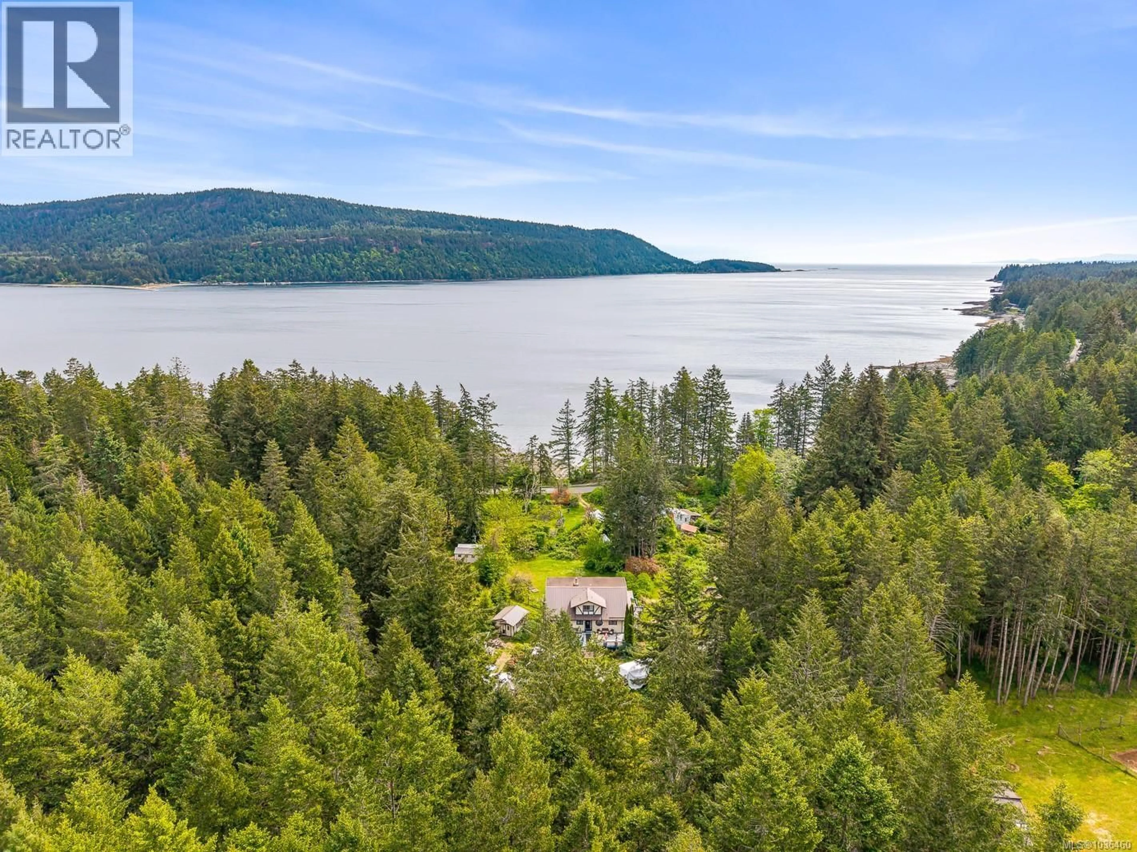 A pic from outside/outdoor area/front of a property/back of a property/a pic from drone, water/lake/river/ocean view for 9510 MCFARLANE ROAD, Denman Island British Columbia V0R1T0
