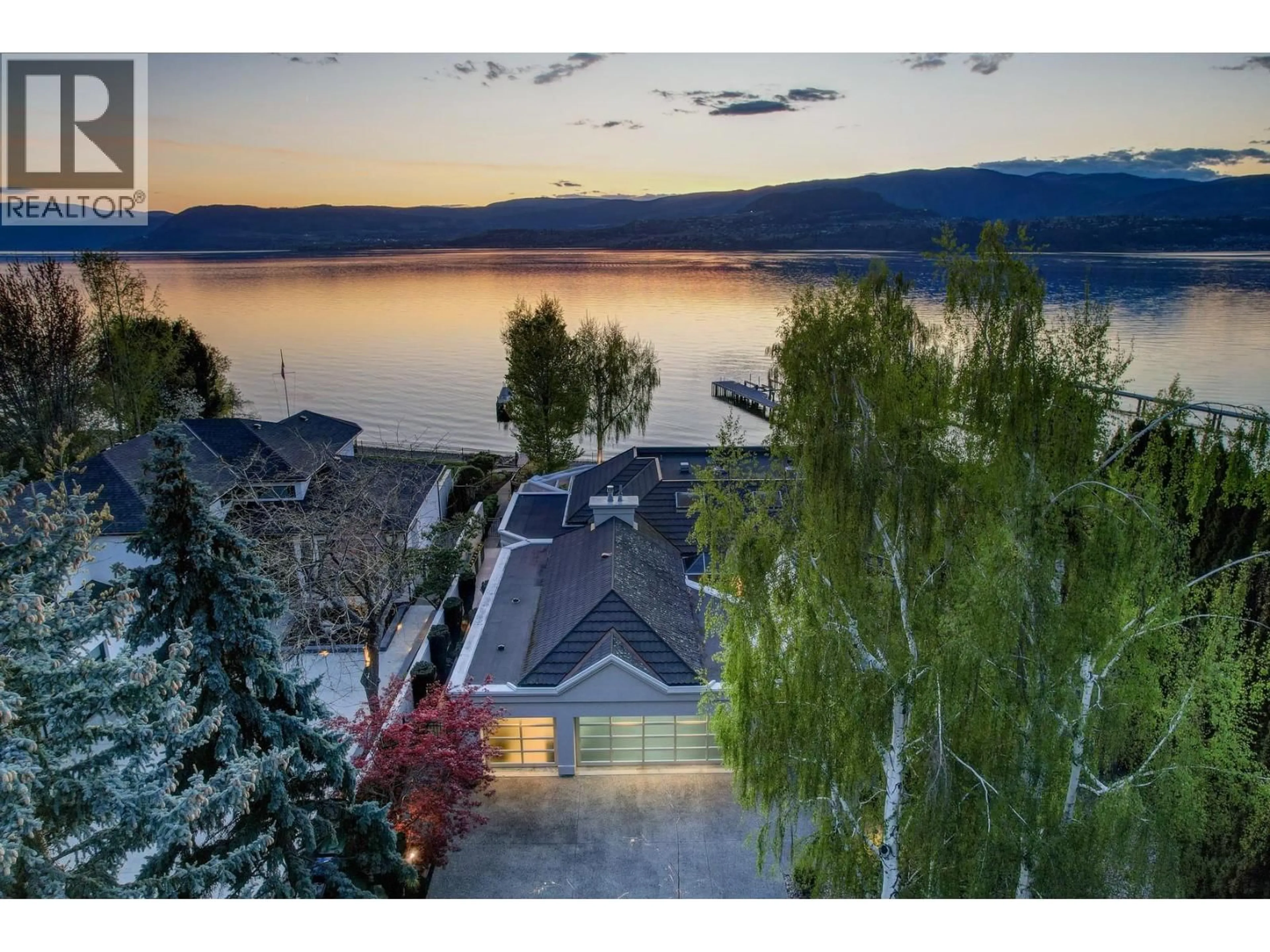 A pic from outside/outdoor area/front of a property/back of a property/a pic from drone, water/lake/river/ocean view for 4458A LAKELAND ROAD, Kelowna British Columbia V1W1C9