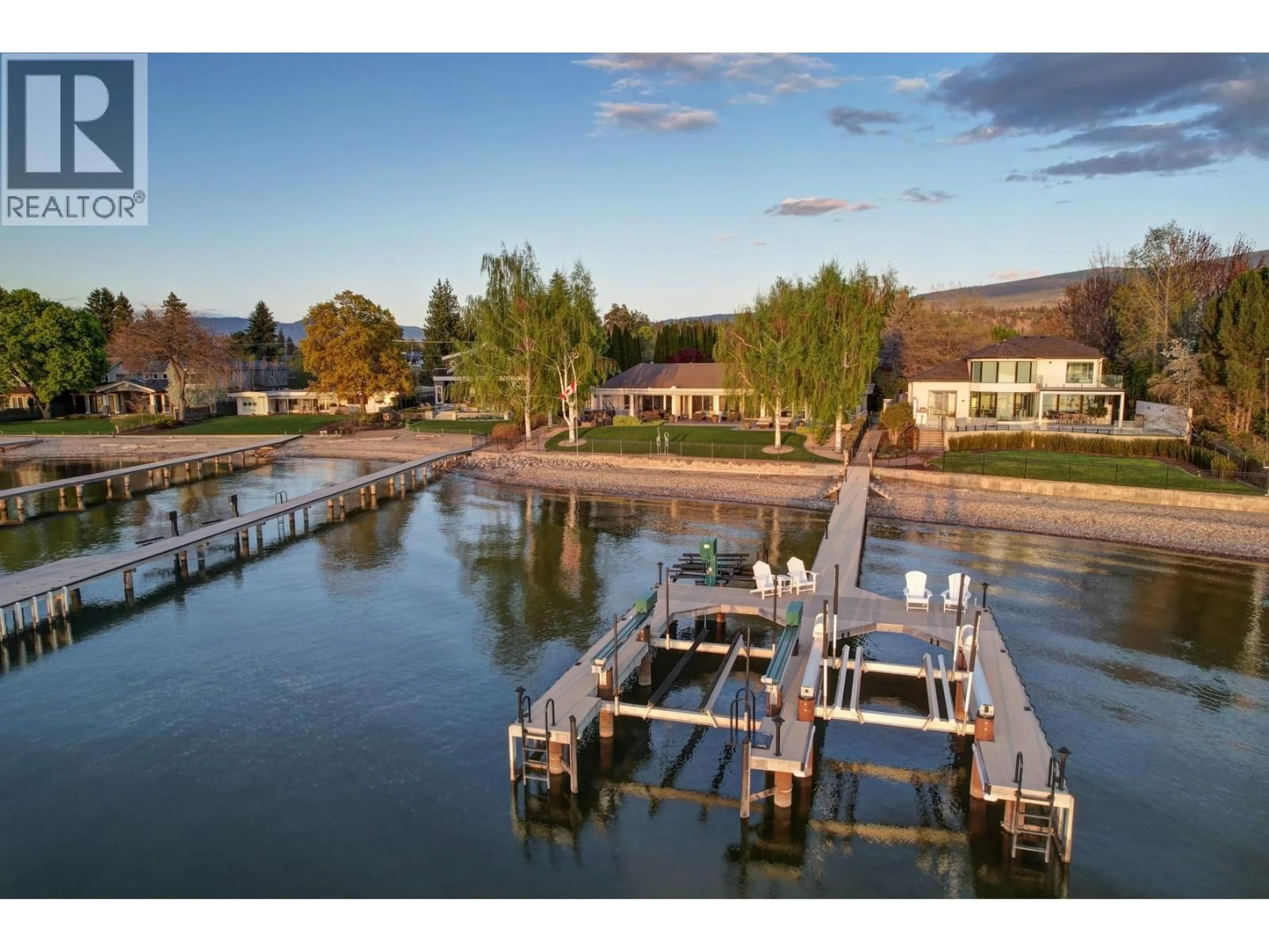 A pic from outside/outdoor area/front of a property/back of a property/a pic from drone, water/lake/river/ocean view for 4458A LAKELAND ROAD, Kelowna British Columbia V1W1C9