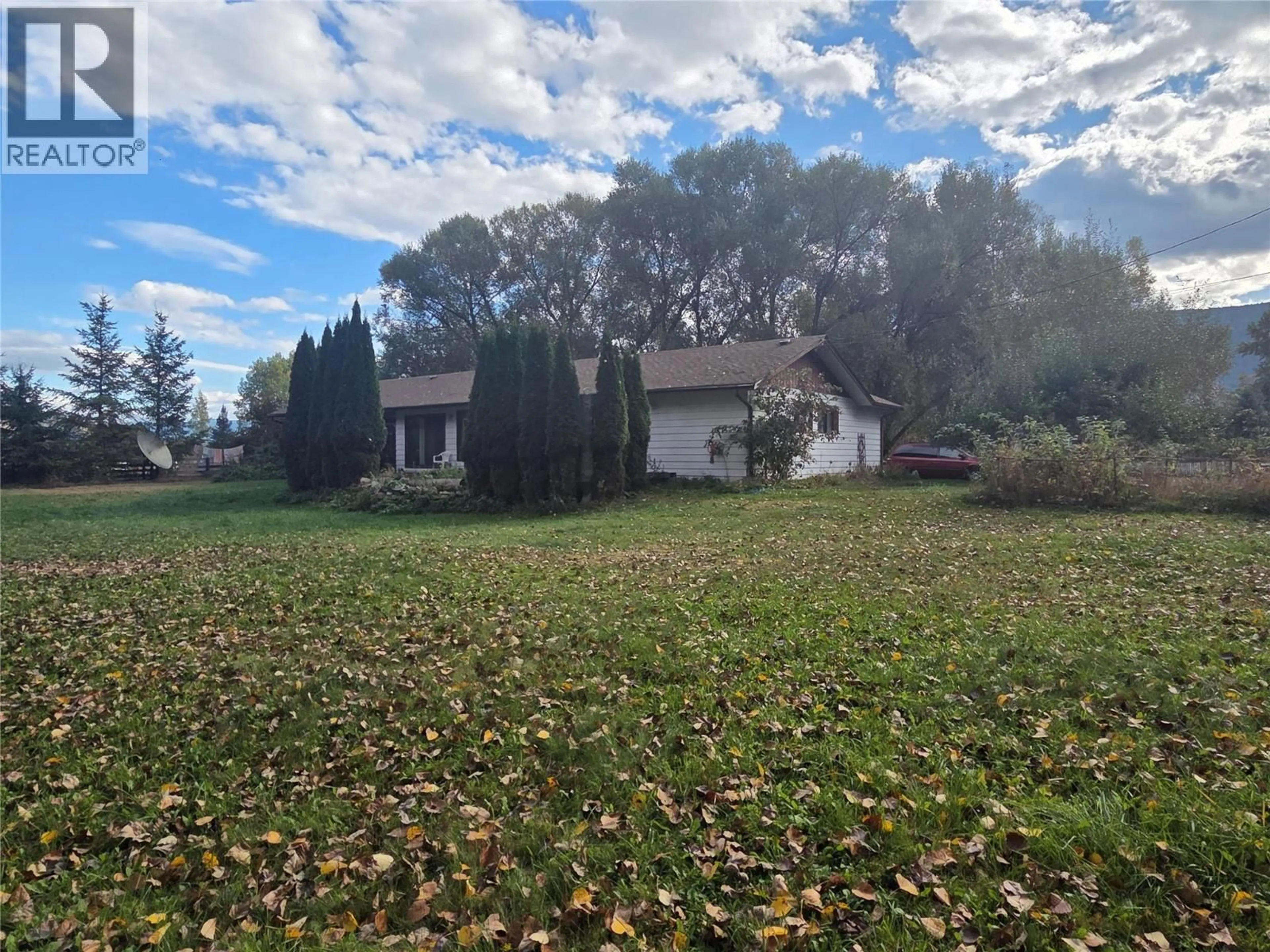 A pic from outside/outdoor area/front of a property/back of a property/a pic from drone, unknown for 26 BARNES ROAD, Lumby British Columbia V0E2G7