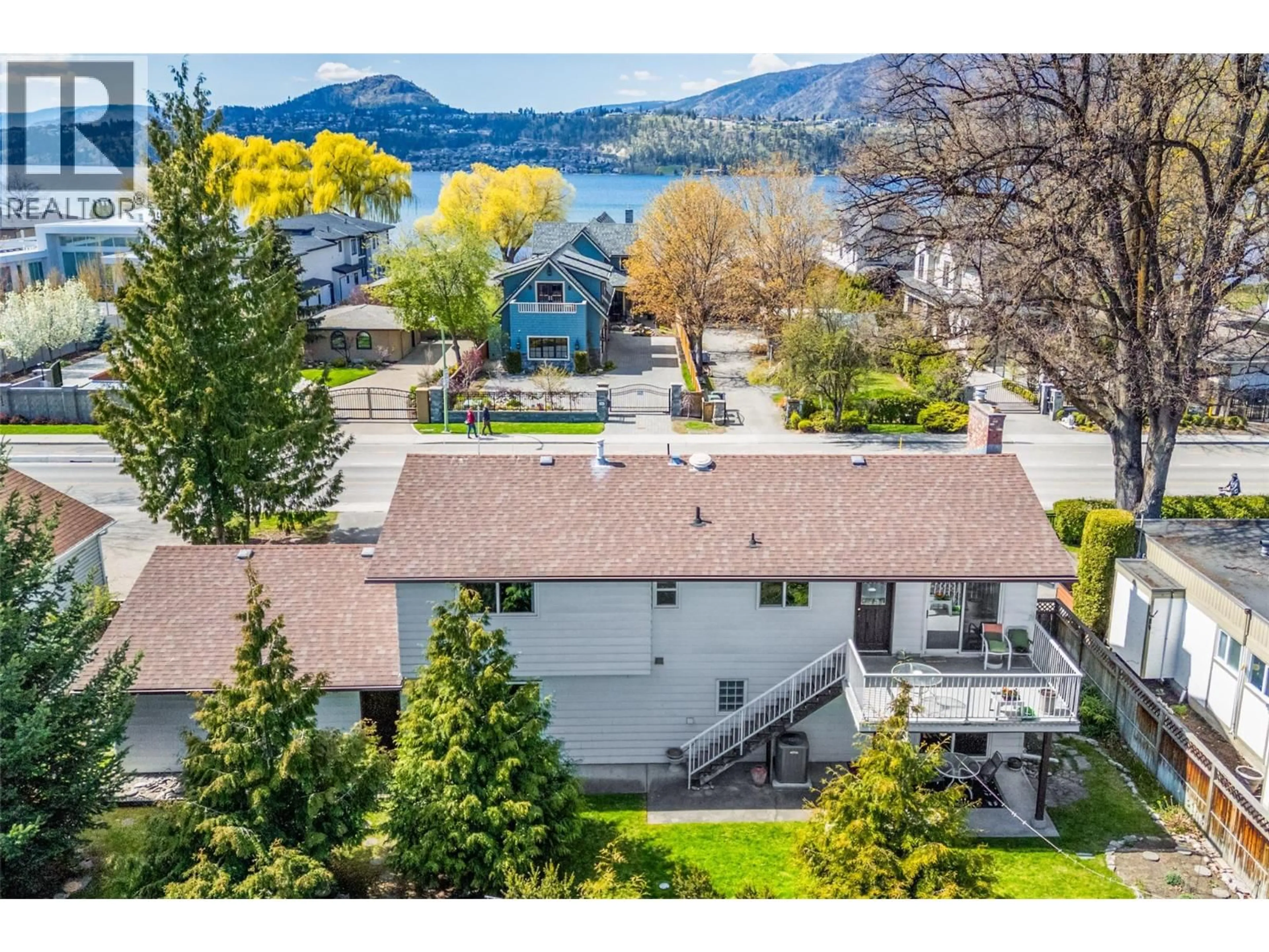 A pic from outside/outdoor area/front of a property/back of a property/a pic from drone, water/lake/river/ocean view for 2681 ABBOTT STREET, Kelowna British Columbia V1Y1G3