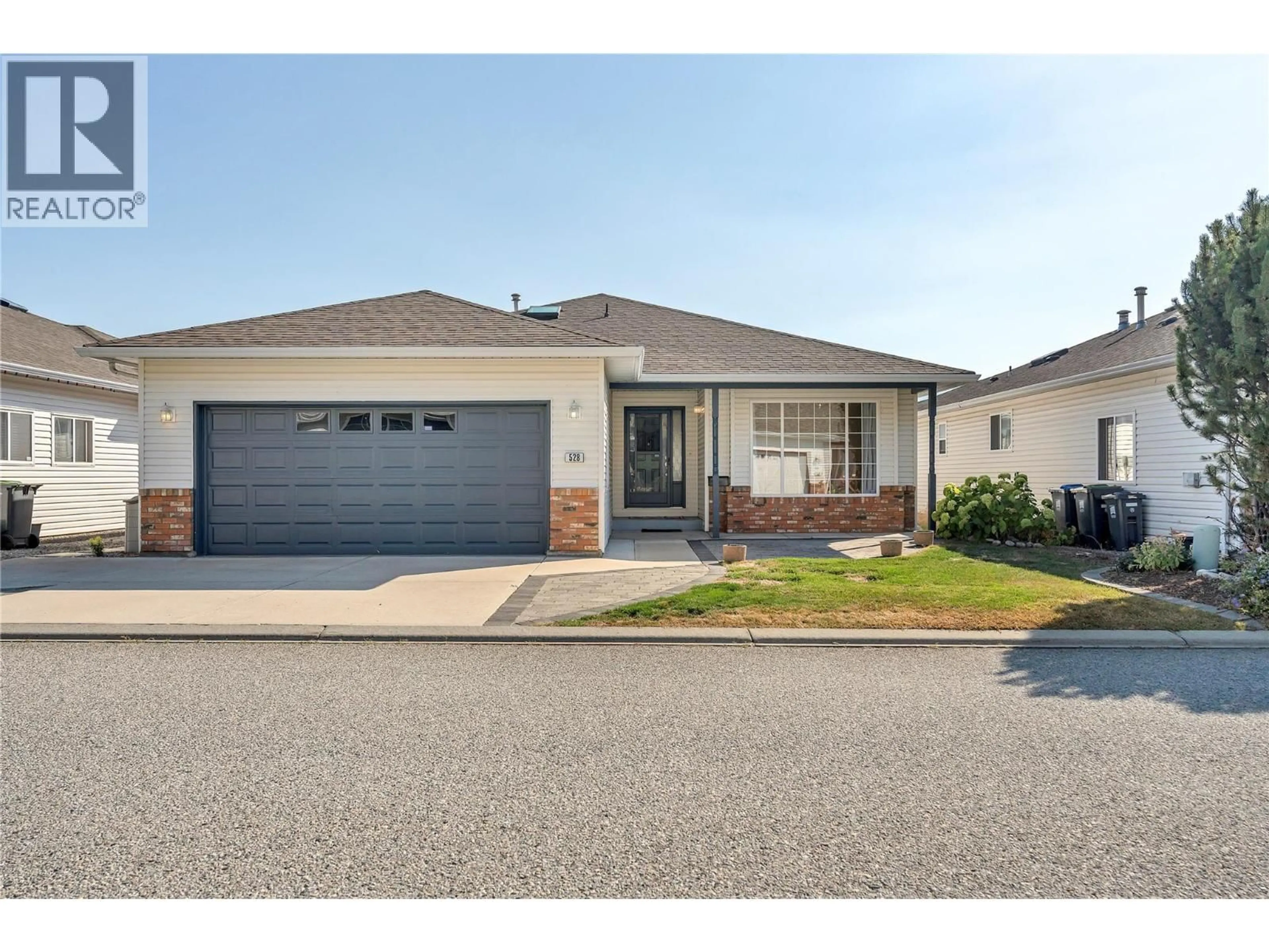 Home with vinyl exterior material, street for 528 RED WING DRIVE, Penticton British Columbia V2A8N7