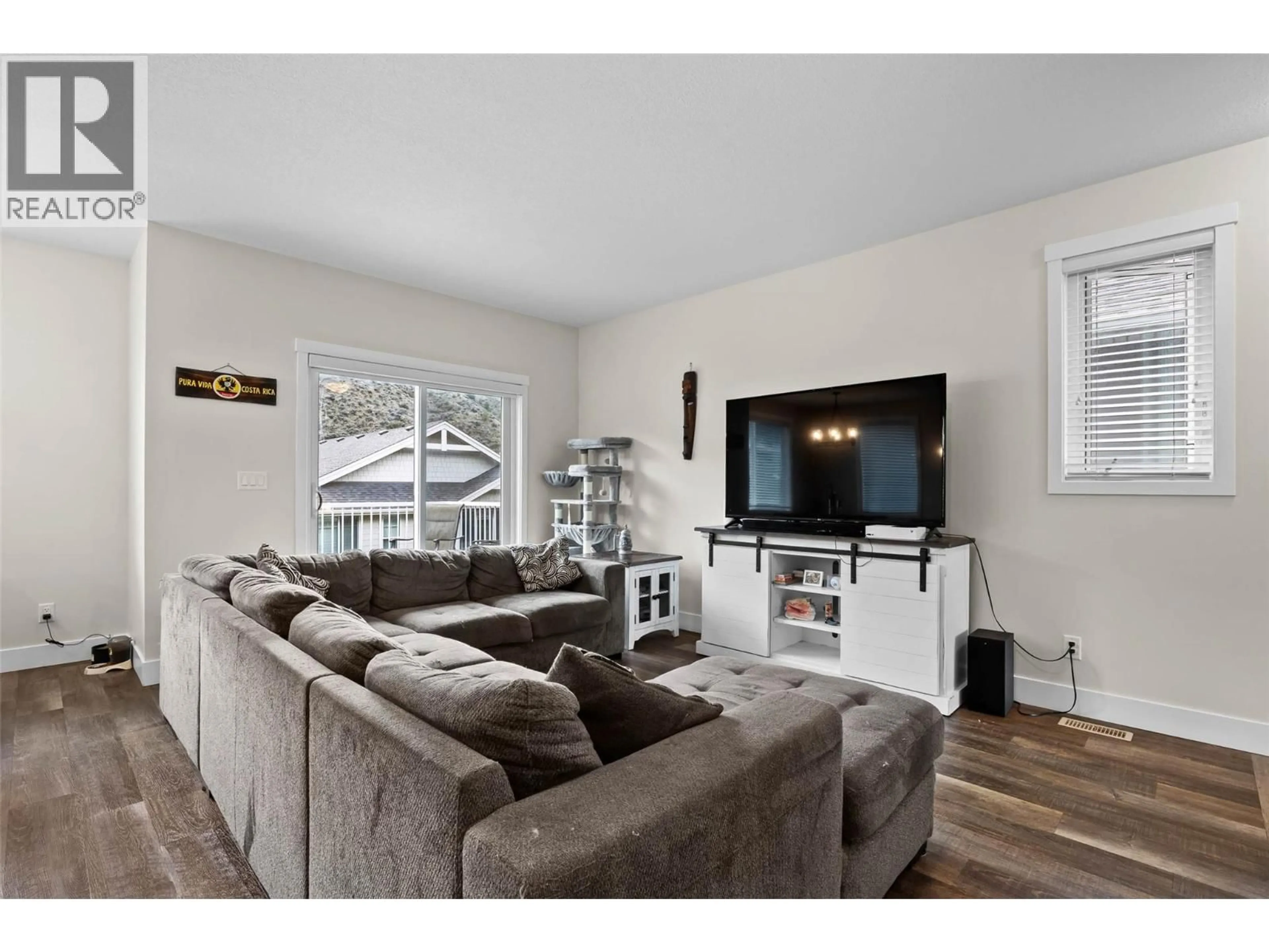 Living room with furniture, wood/laminate floor for 169 - 200 GRAND BOULEVARD, Kamloops British Columbia V2C0H3