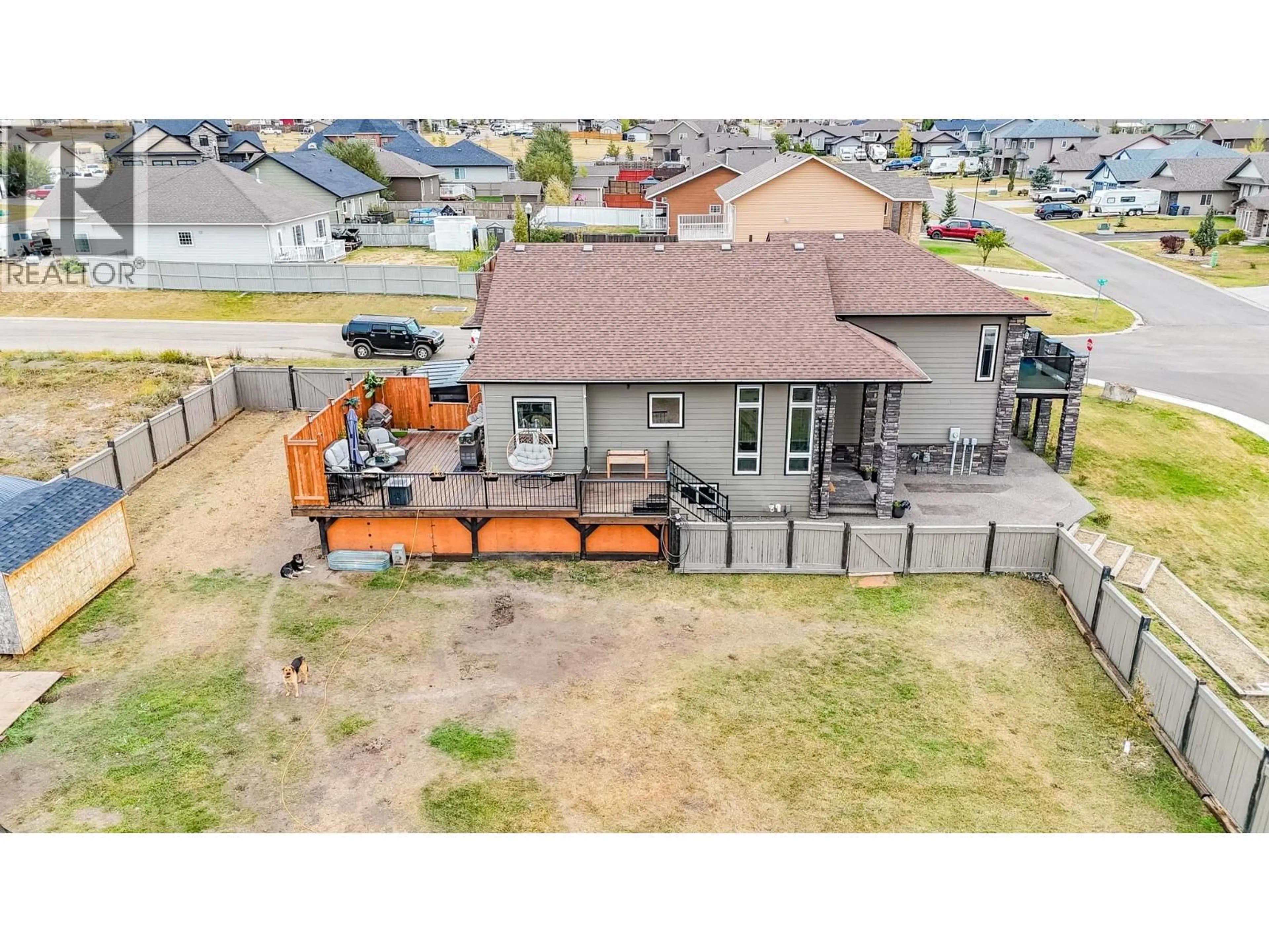 A pic from outside/outdoor area/front of a property/back of a property/a pic from drone, building for 1916/1920 87 AVENUE, Dawson Creek British Columbia V1G4T8