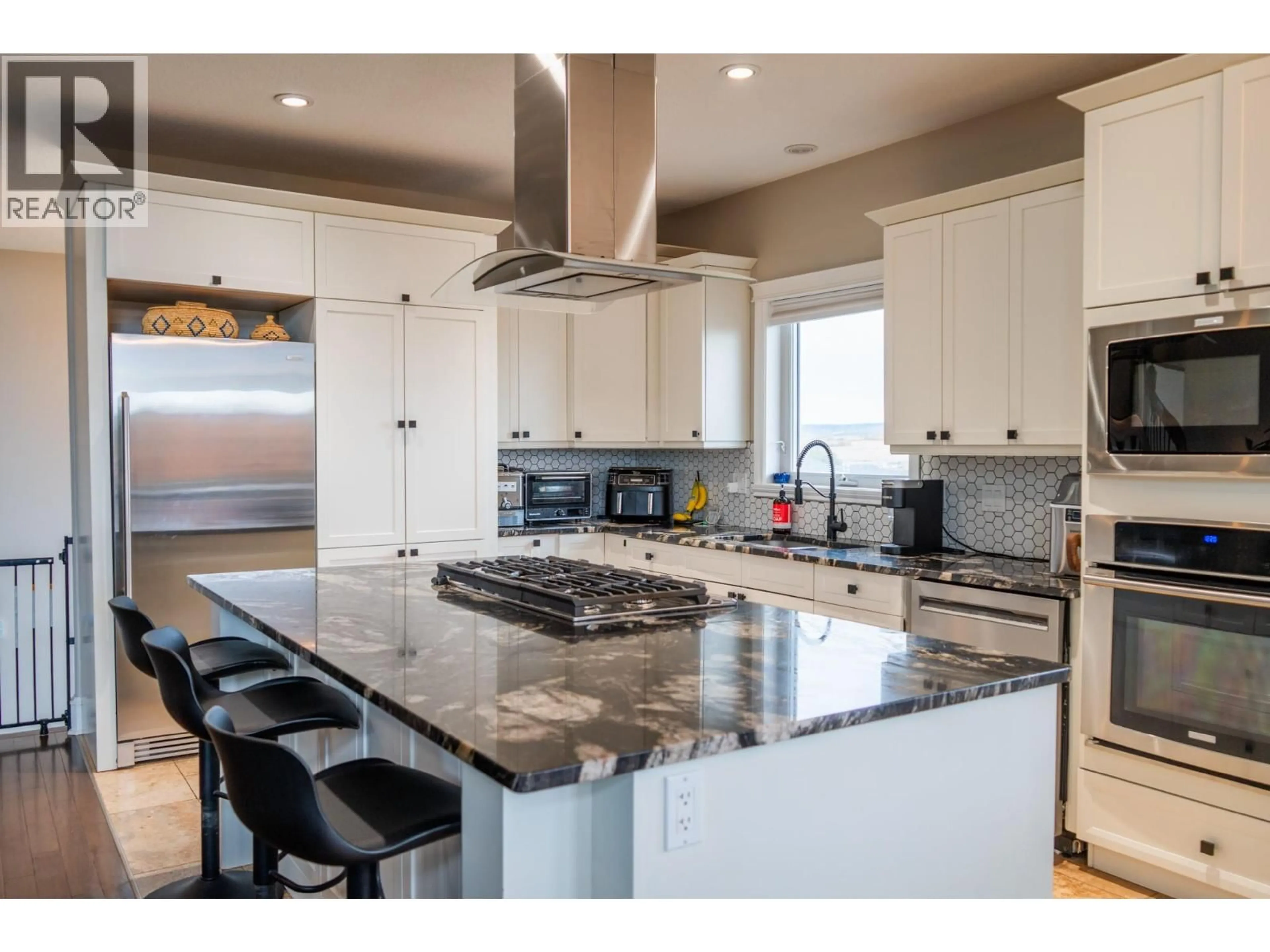 Open concept kitchen, ceramic/tile floor for 1916/1920 87 AVENUE, Dawson Creek British Columbia V1G4T8