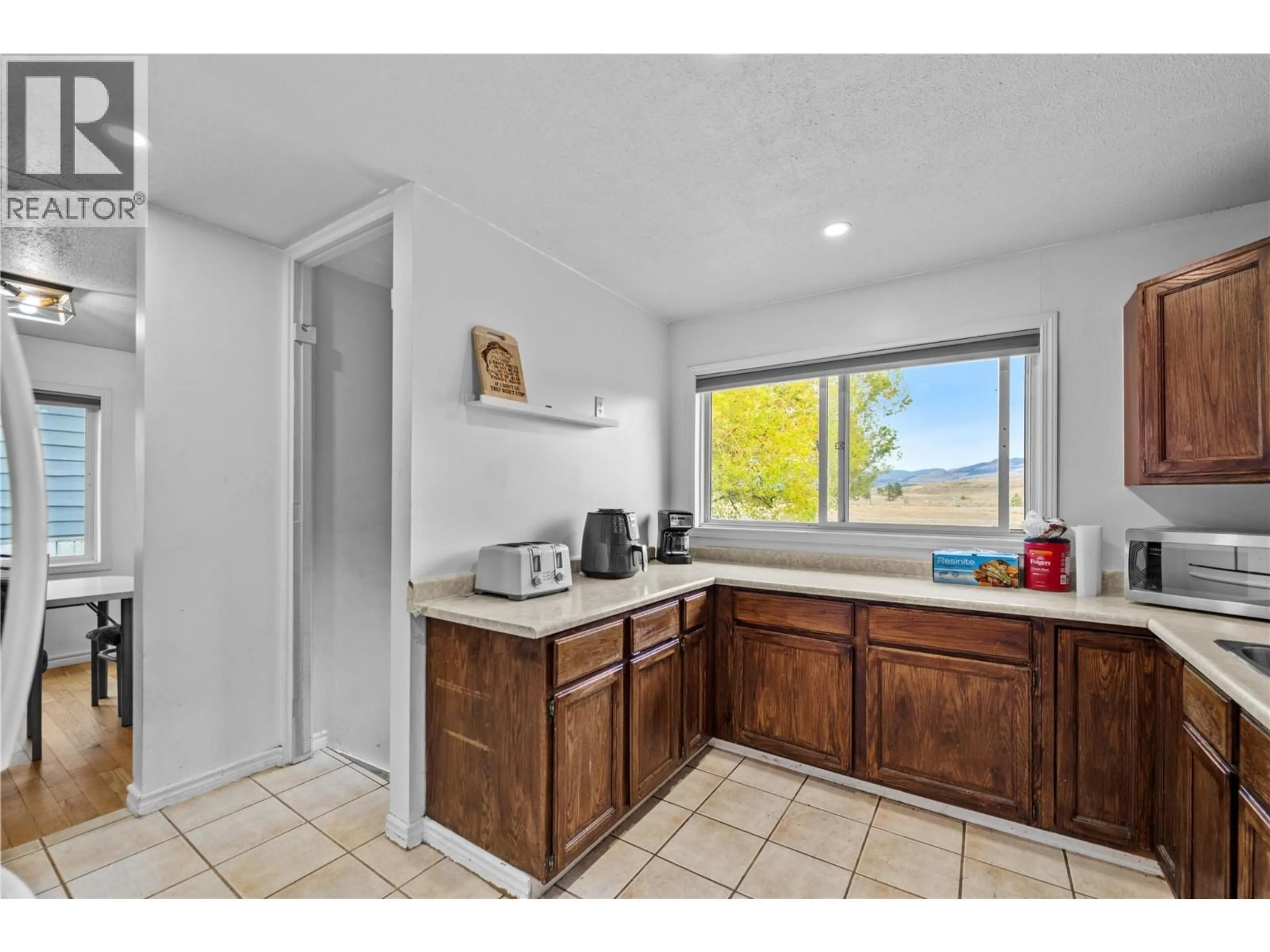 Standard kitchen, ceramic/tile floor for 1810 ARMSTRONG STREET, Merritt British Columbia V1K0B1