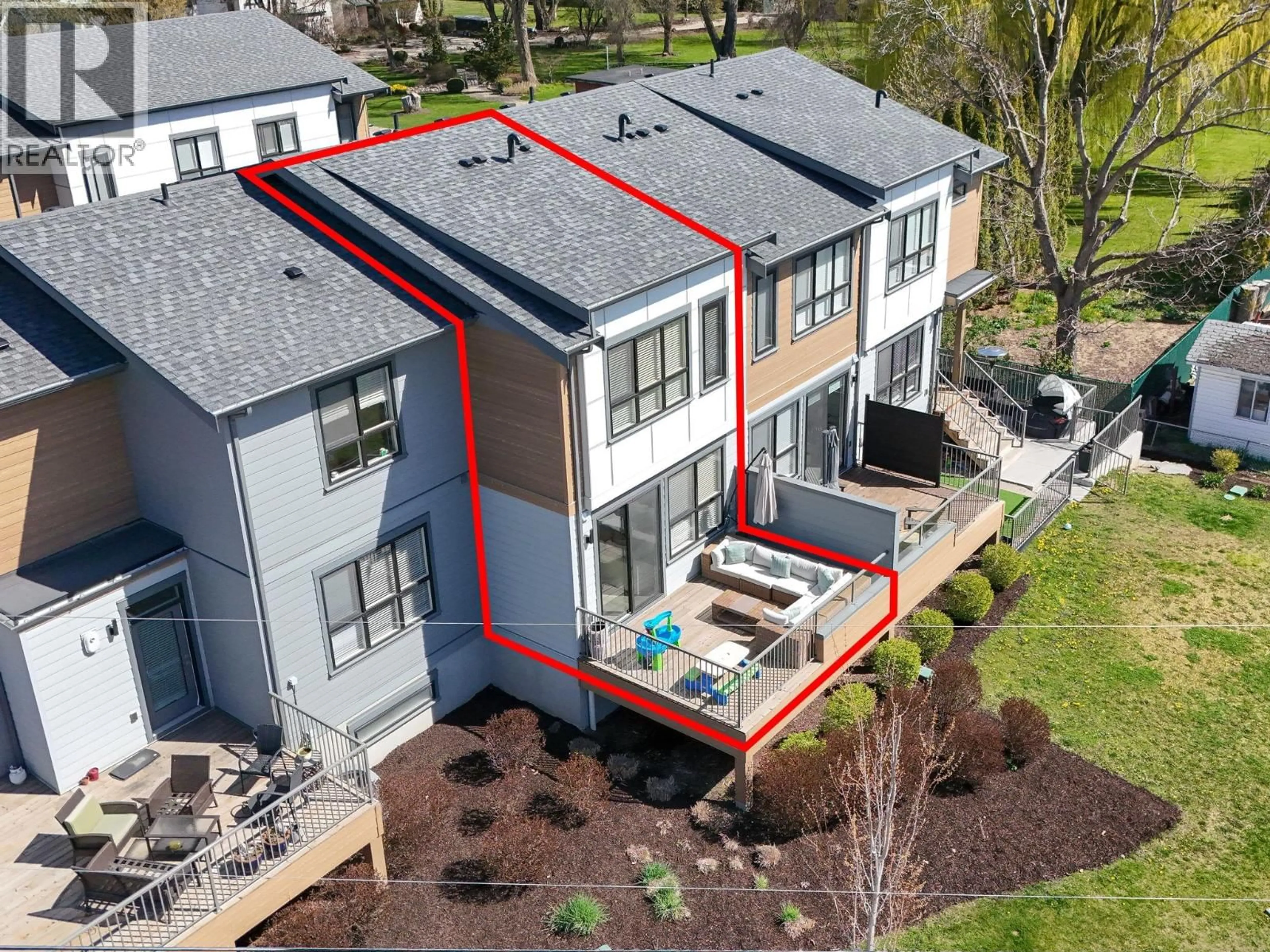 A pic from outside/outdoor area/front of a property/back of a property/a pic from drone, unknown for 403 - 11581 ROGERS ROAD, Lake Country British Columbia V4V1X8