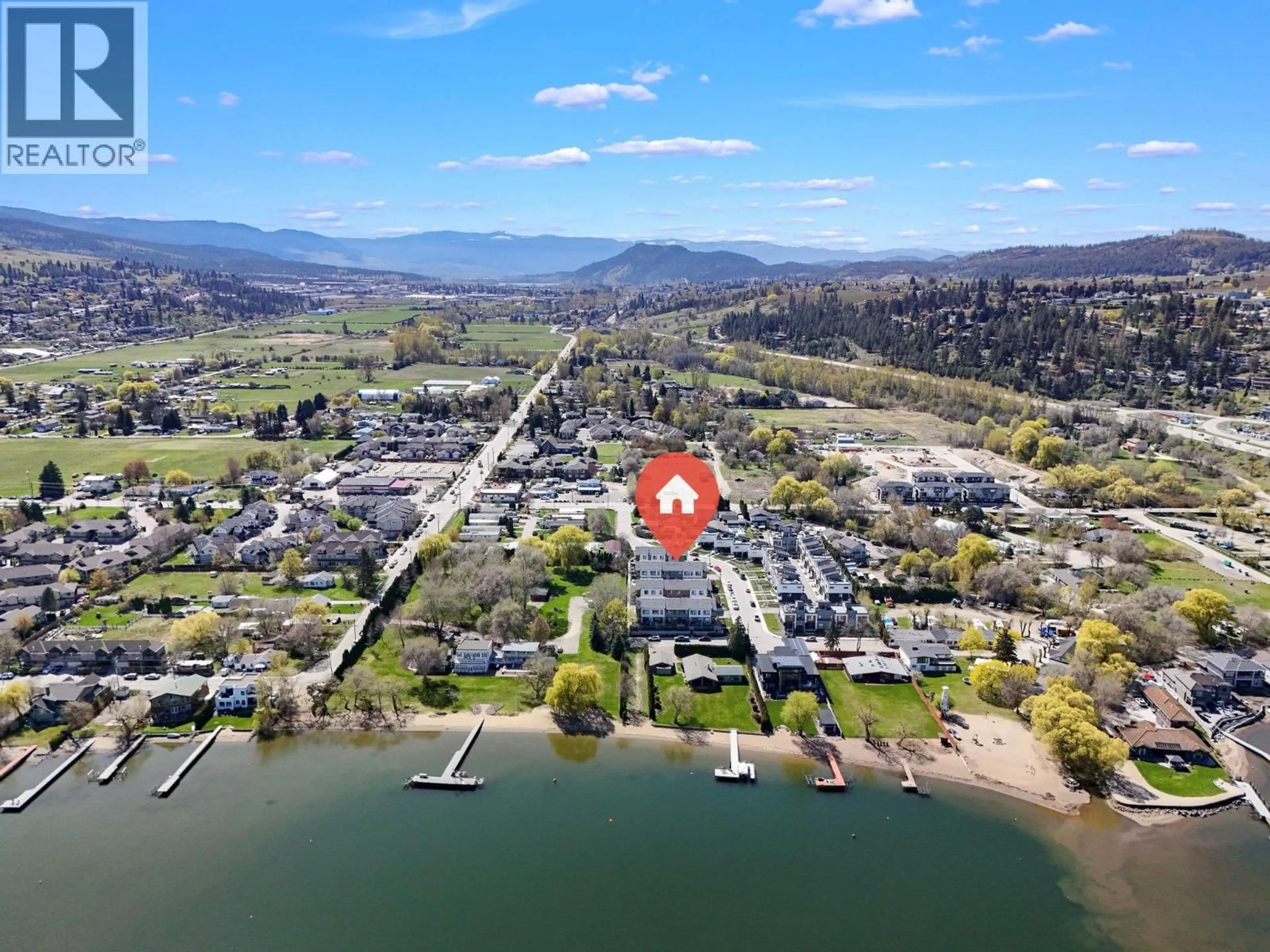 A pic from outside/outdoor area/front of a property/back of a property/a pic from drone, water/lake/river/ocean view for 403 - 11581 ROGERS ROAD, Lake Country British Columbia V4V1X8