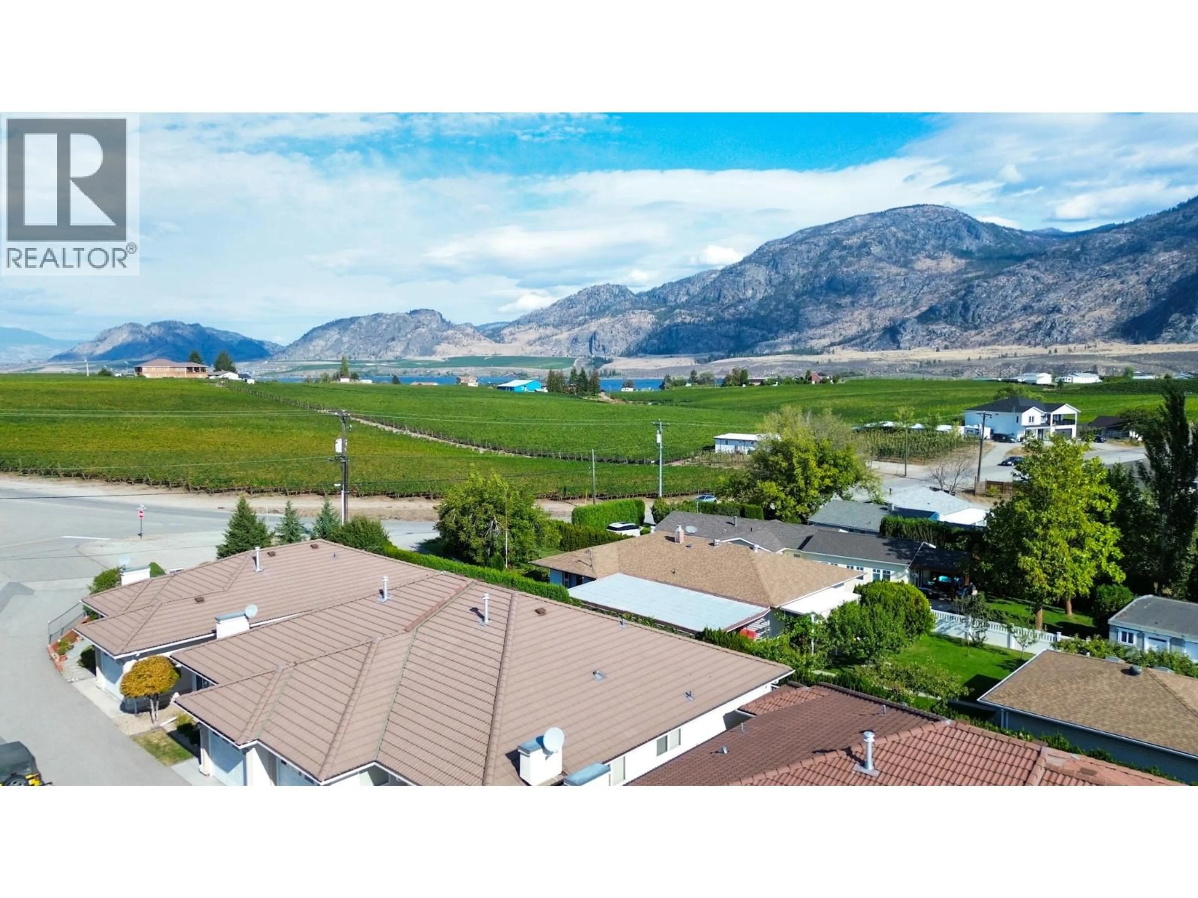 A pic from outside/outdoor area/front of a property/back of a property/a pic from drone, mountain view for 11 - 2 ROYAL ANN COURT, Osoyoos British Columbia V0H1V2