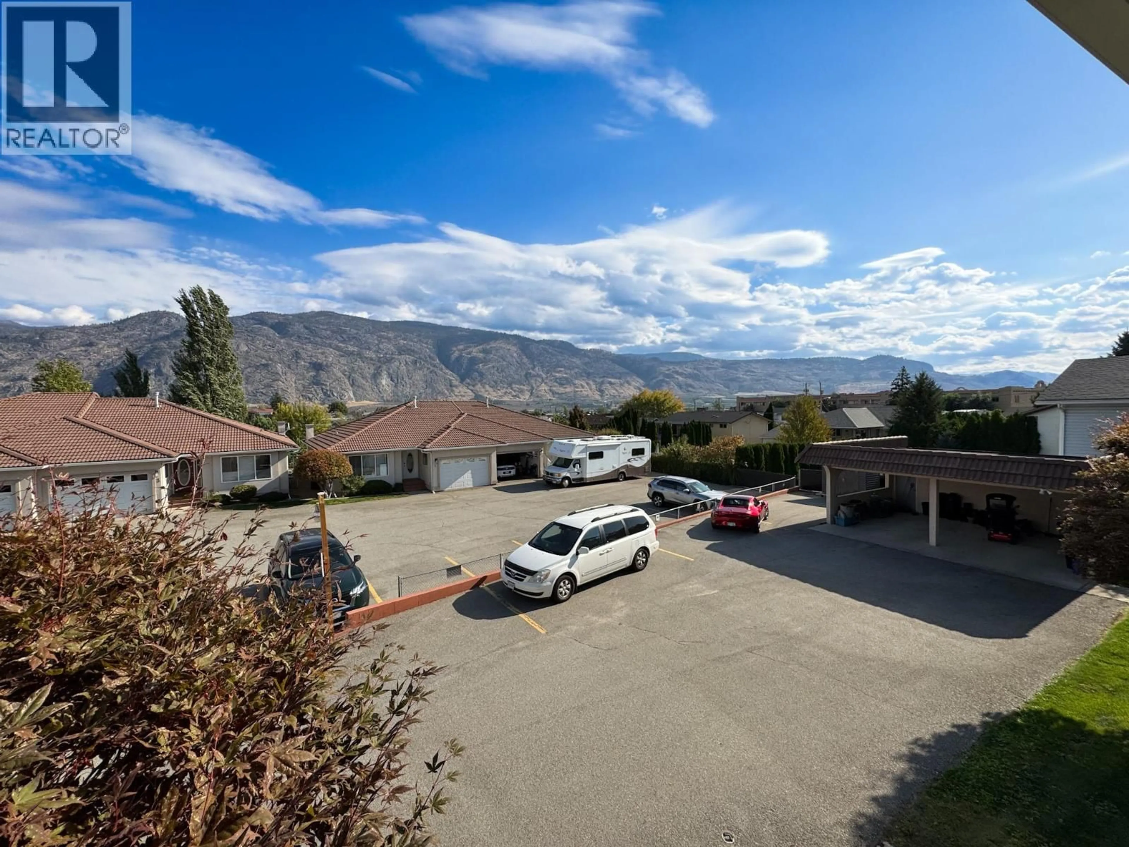 A pic from outside/outdoor area/front of a property/back of a property/a pic from drone, mountain view for 11 - 2 ROYAL ANN COURT, Osoyoos British Columbia V0H1V2