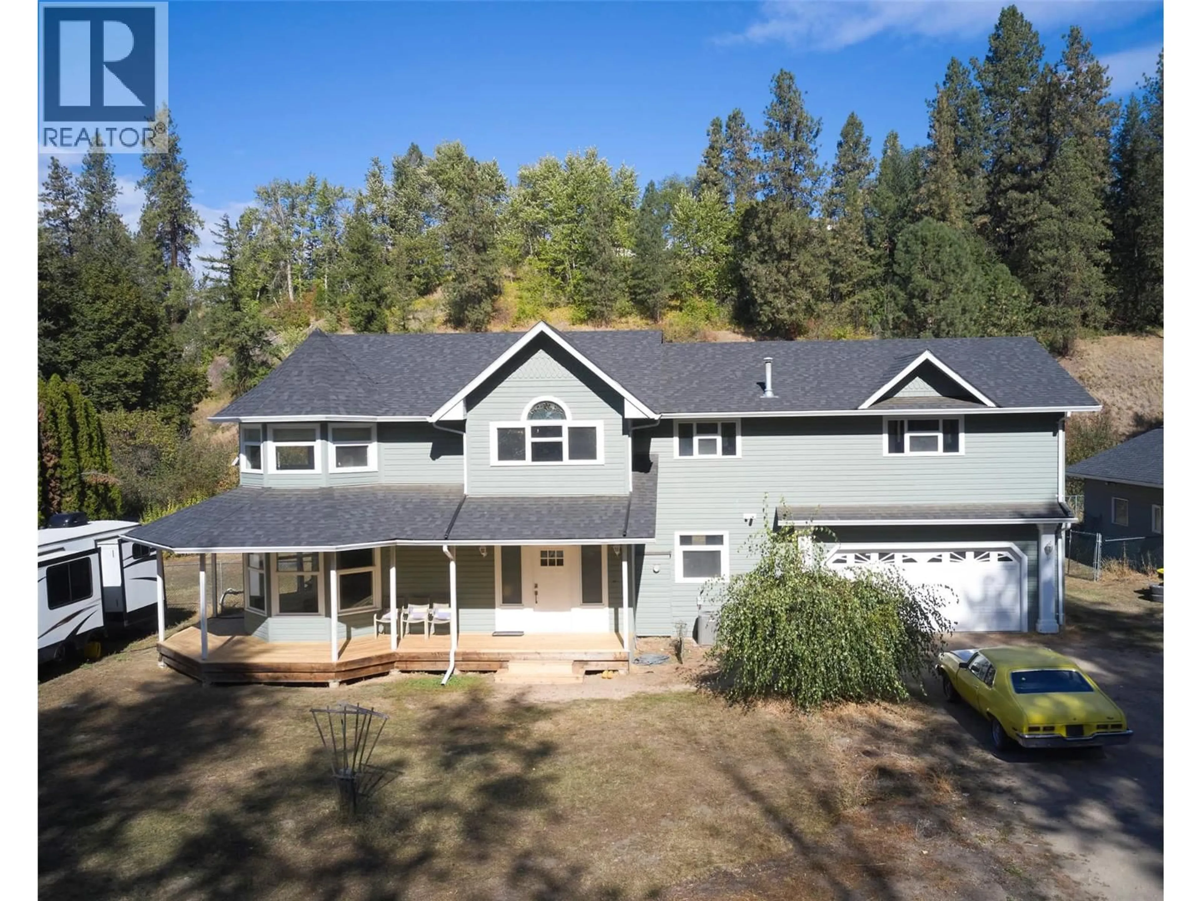 A pic from outside/outdoor area/front of a property/back of a property/a pic from drone, unknown for 1065 BX ROAD, Vernon British Columbia V1B3K2