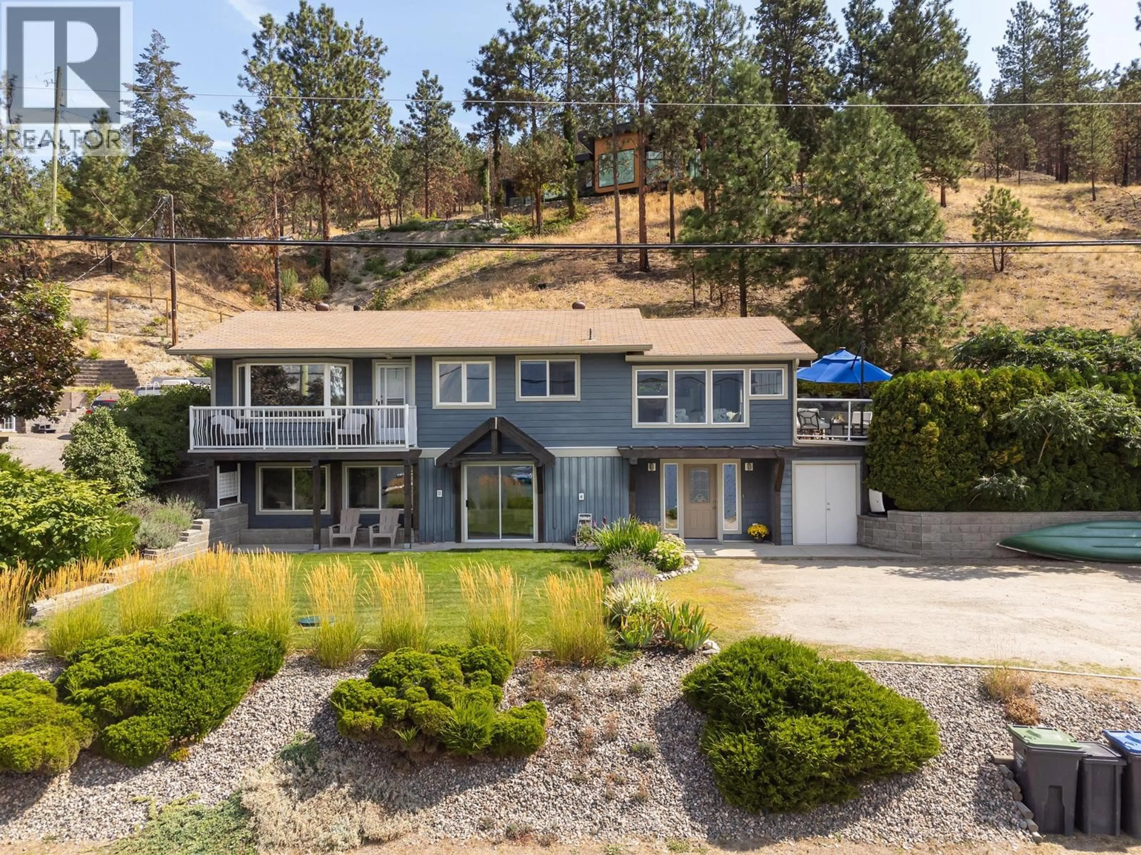 A pic from outside/outdoor area/front of a property/back of a property/a pic from drone, unknown for 10837 OKANAGAN CENTRE ROAD WEST, Lake Country British Columbia V4V2H8