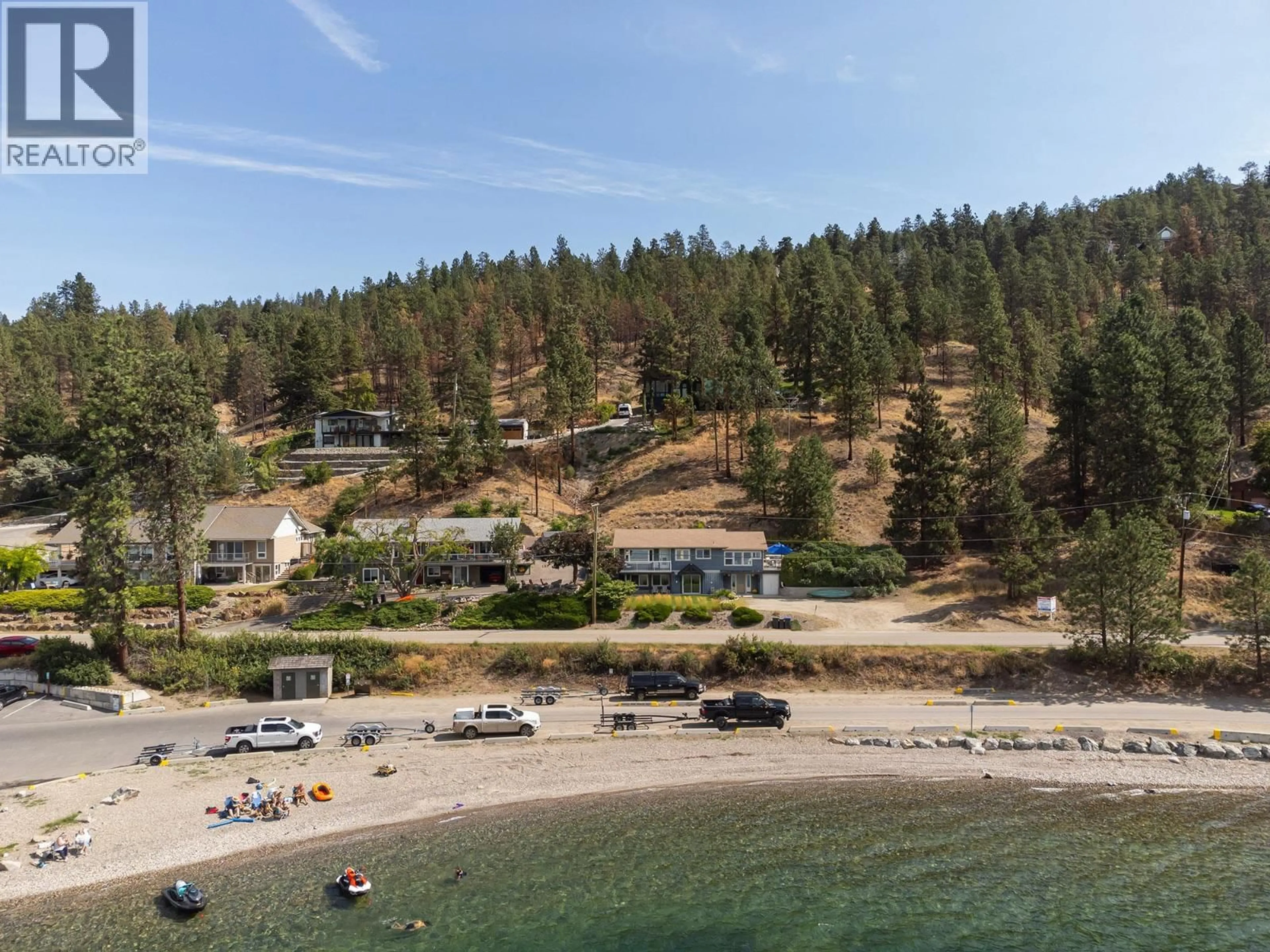A pic from outside/outdoor area/front of a property/back of a property/a pic from drone, water/lake/river/ocean view for 10837 OKANAGAN CENTRE ROAD WEST, Lake Country British Columbia V4V2H8