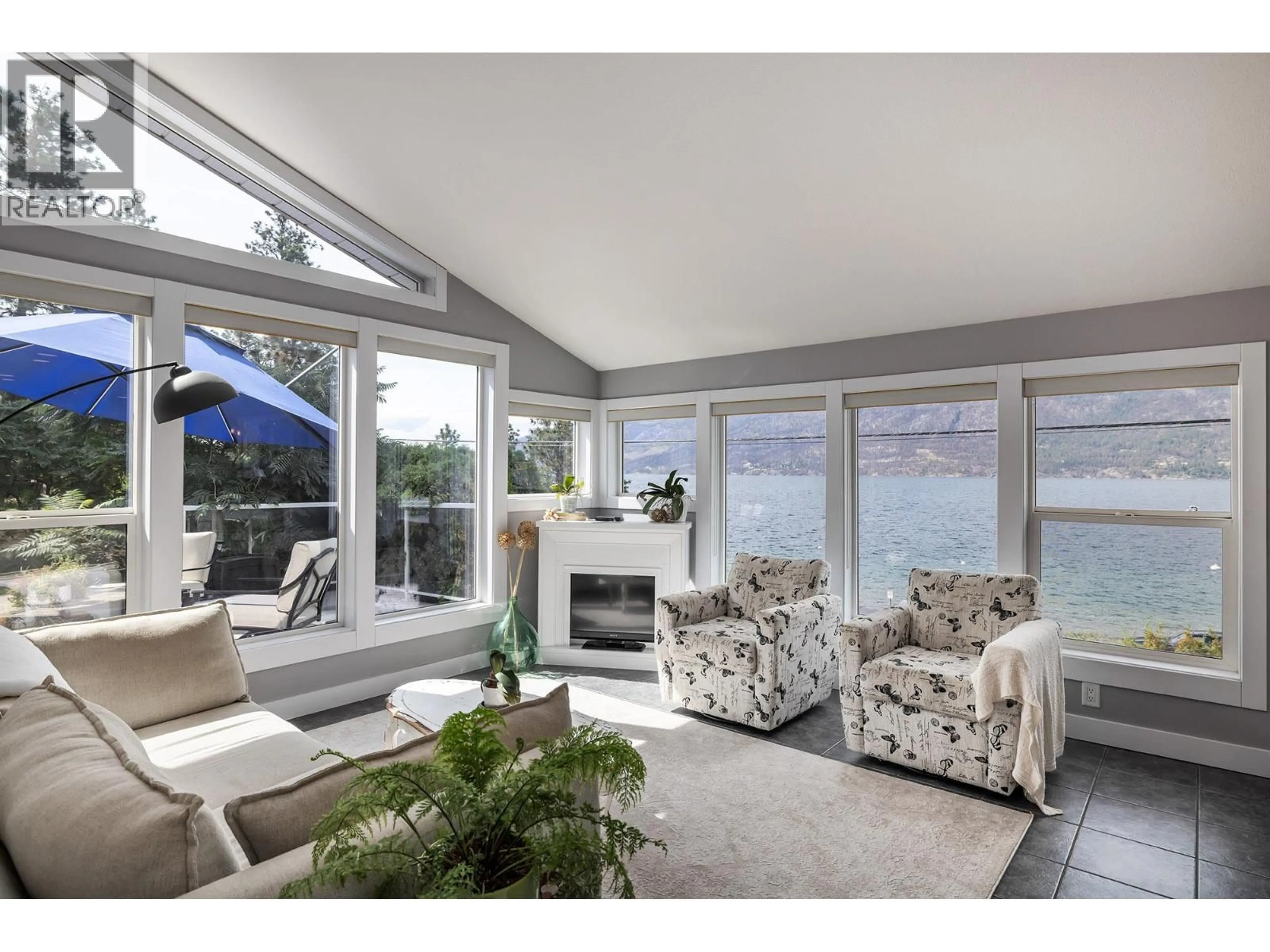 Living room with furniture, unknown for 10837 OKANAGAN CENTRE ROAD WEST, Lake Country British Columbia V4V2H8