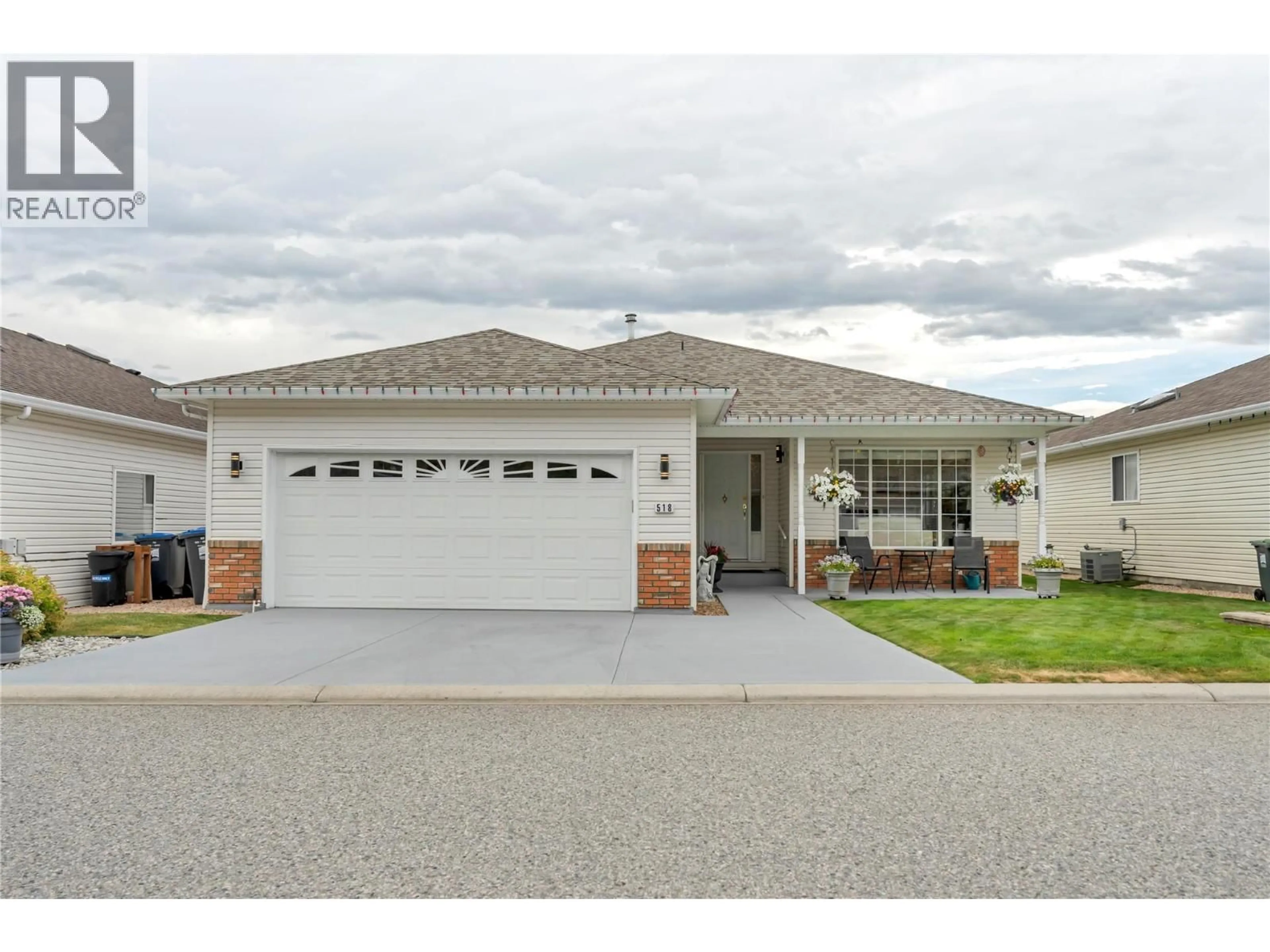 Home with vinyl exterior material, street for 518 RED WING DRIVE, Penticton British Columbia V2A8N7