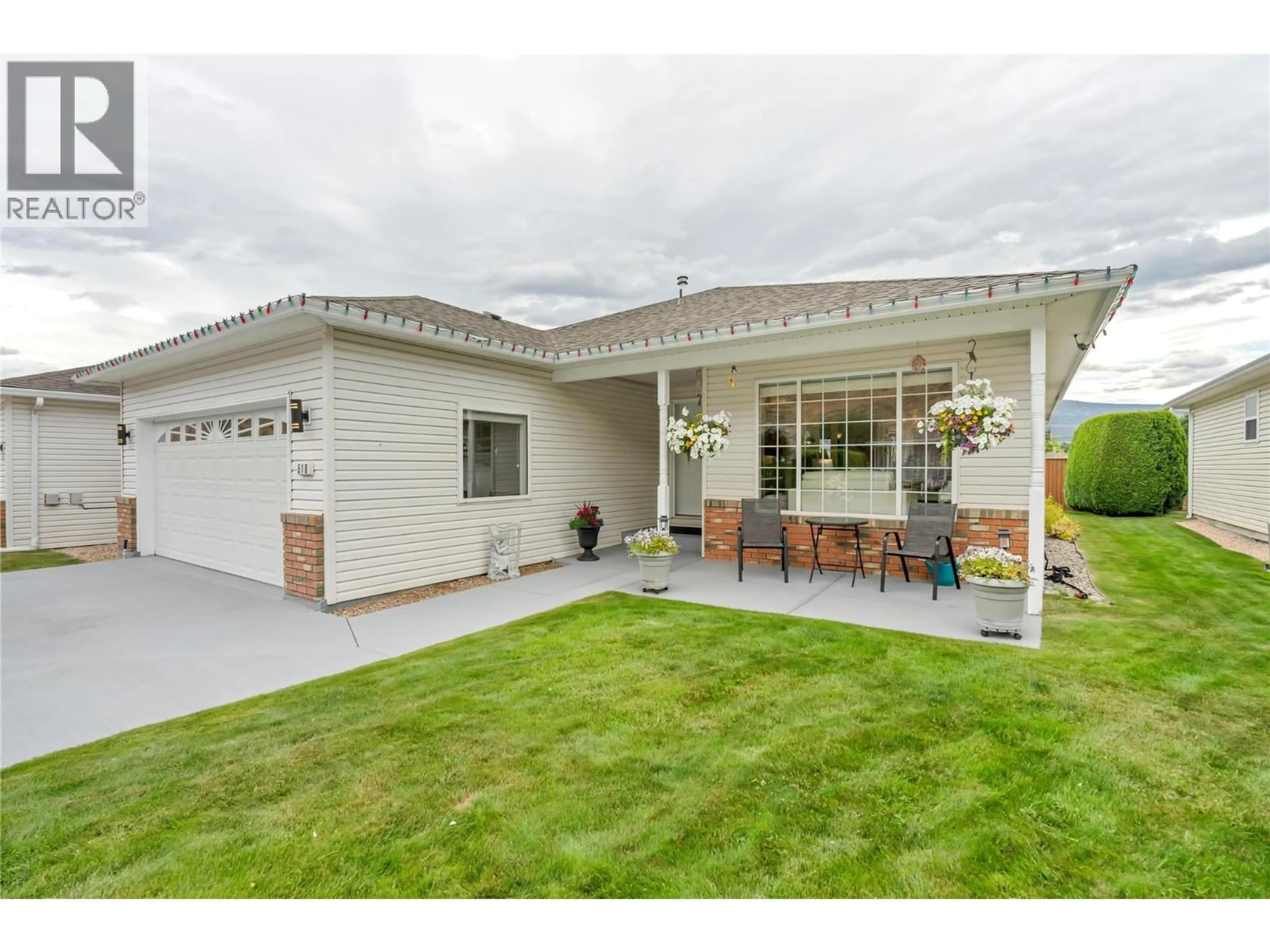 Home with vinyl exterior material, street for 518 RED WING DRIVE, Penticton British Columbia V2A8N7