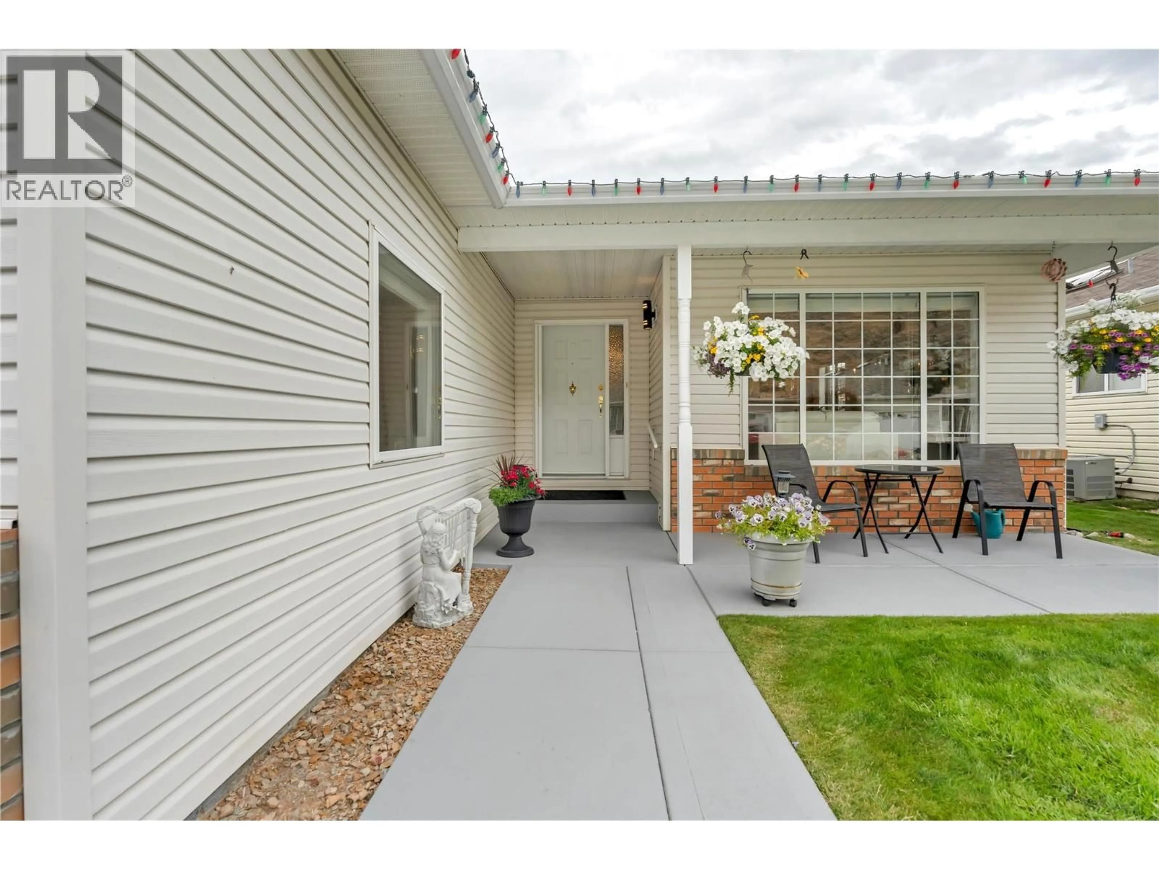 Home with vinyl exterior material, street for 518 RED WING DRIVE, Penticton British Columbia V2A8N7