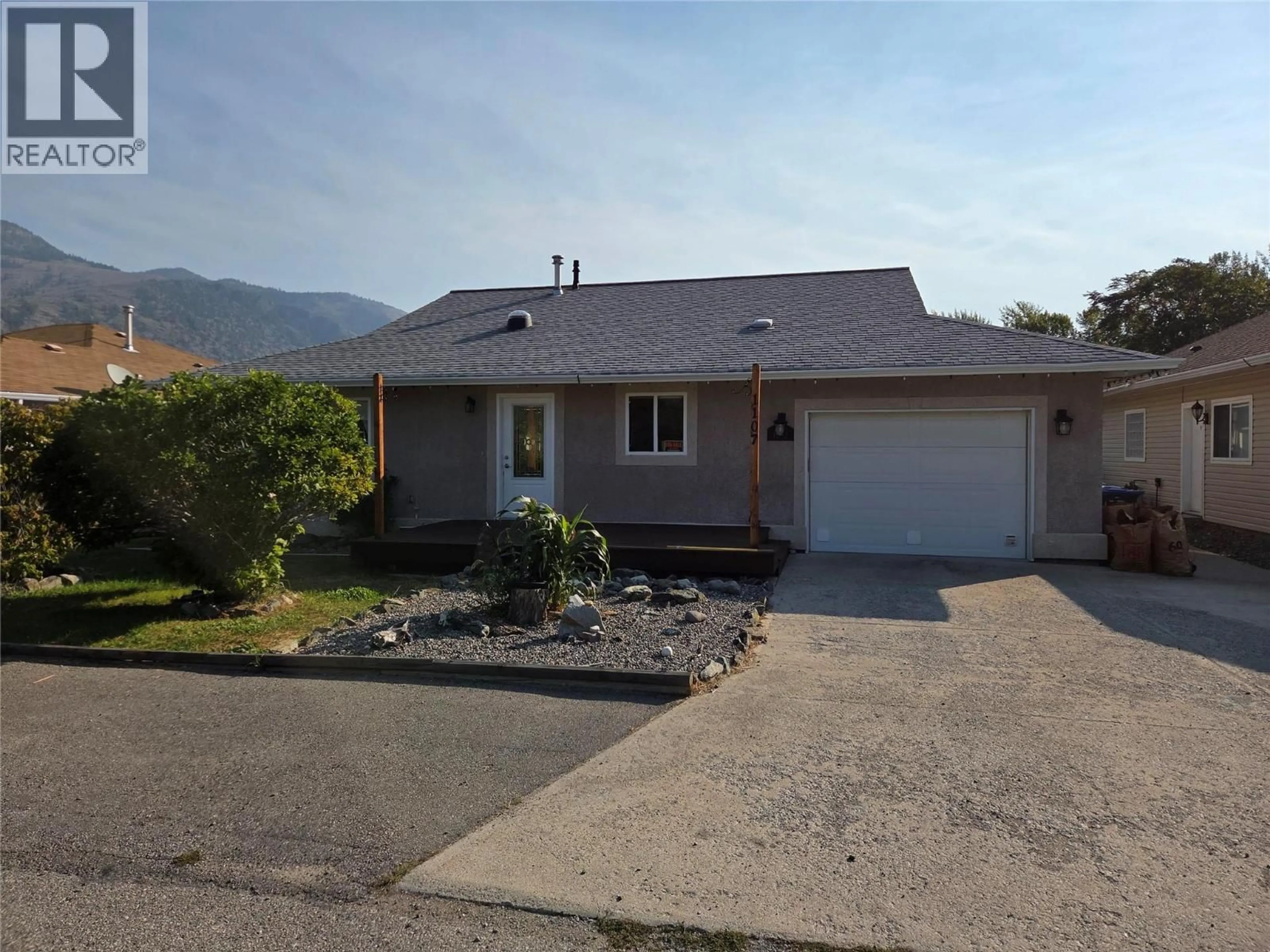 Home with vinyl exterior material, mountain view for 1107 8TH STREET, Keremeos British Columbia V0X1N3
