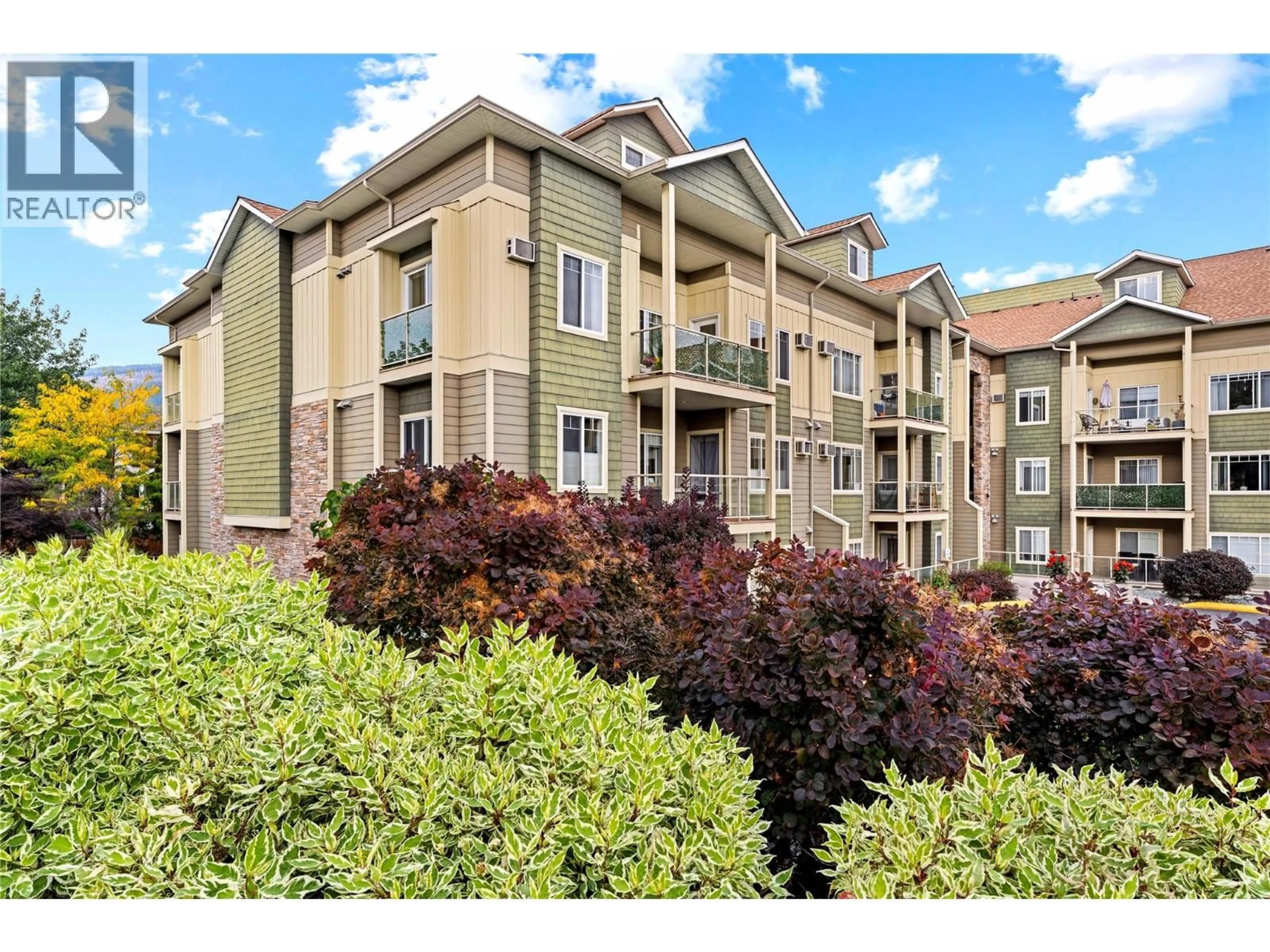 A pic from outside/outdoor area/front of a property/back of a property/a pic from drone, mountain view for 302 - 2120 SHANNON RIDGE DRIVE, West Kelowna British Columbia V4T2Z3