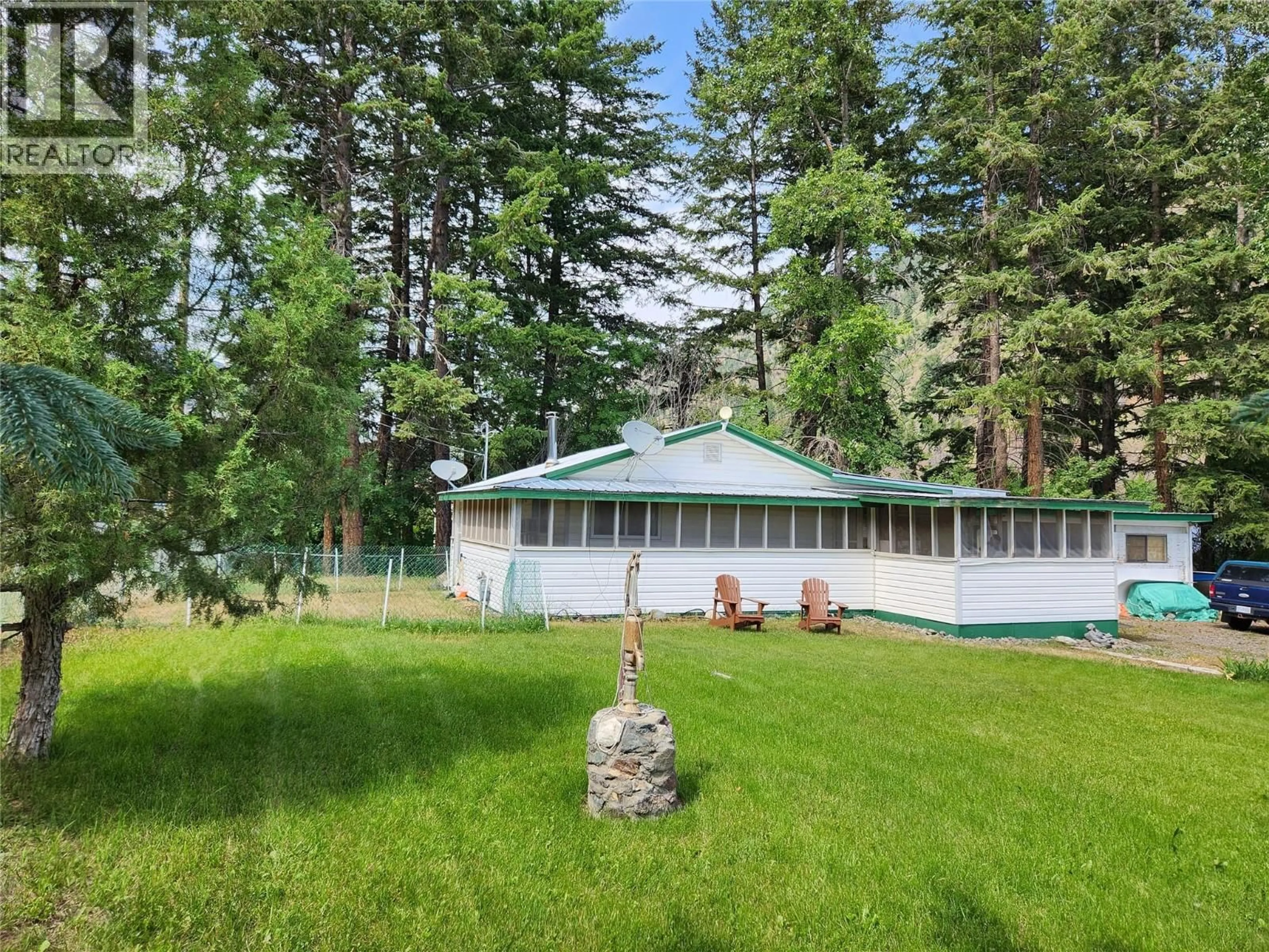 A pic from outside/outdoor area/front of a property/back of a property/a pic from drone, forest/trees view for 1483 MAIN STREET, Olalla British Columbia V0X1N6