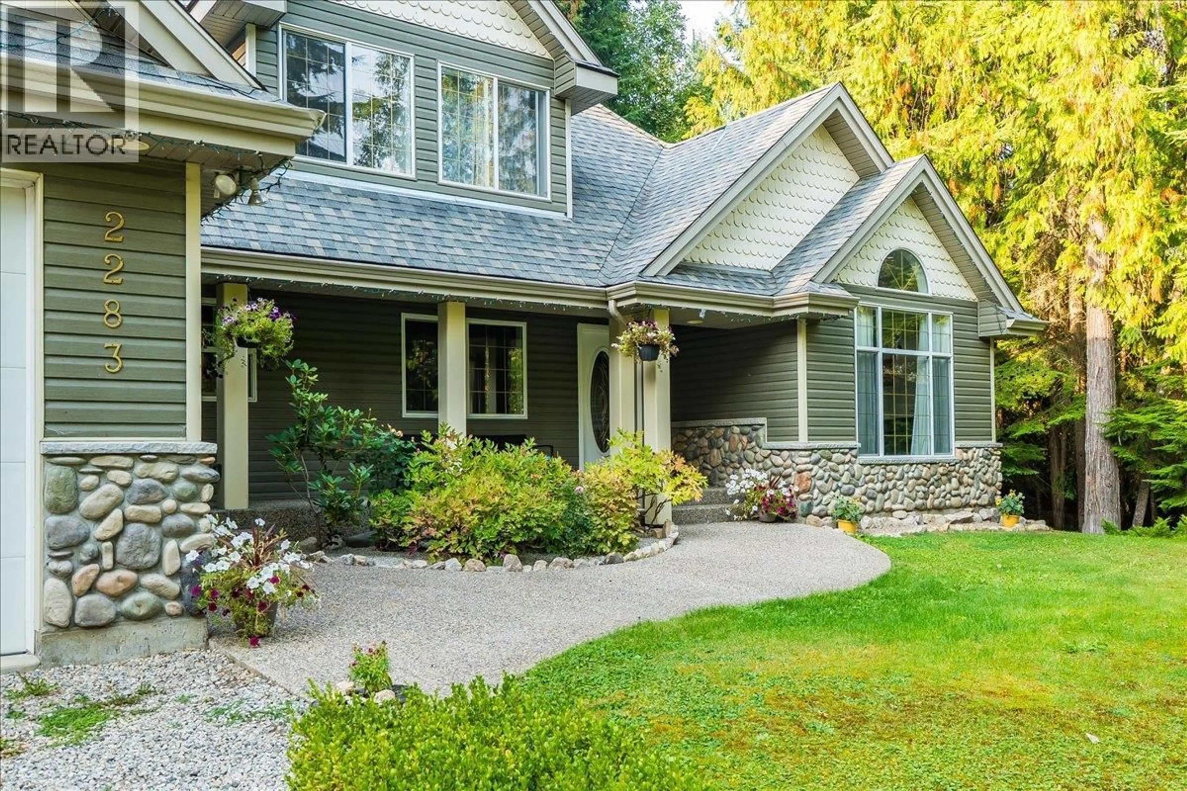 Home with vinyl exterior material, street for 2283 CRYSTAL SPRINGS ROAD, Nelson British Columbia V1L6K4