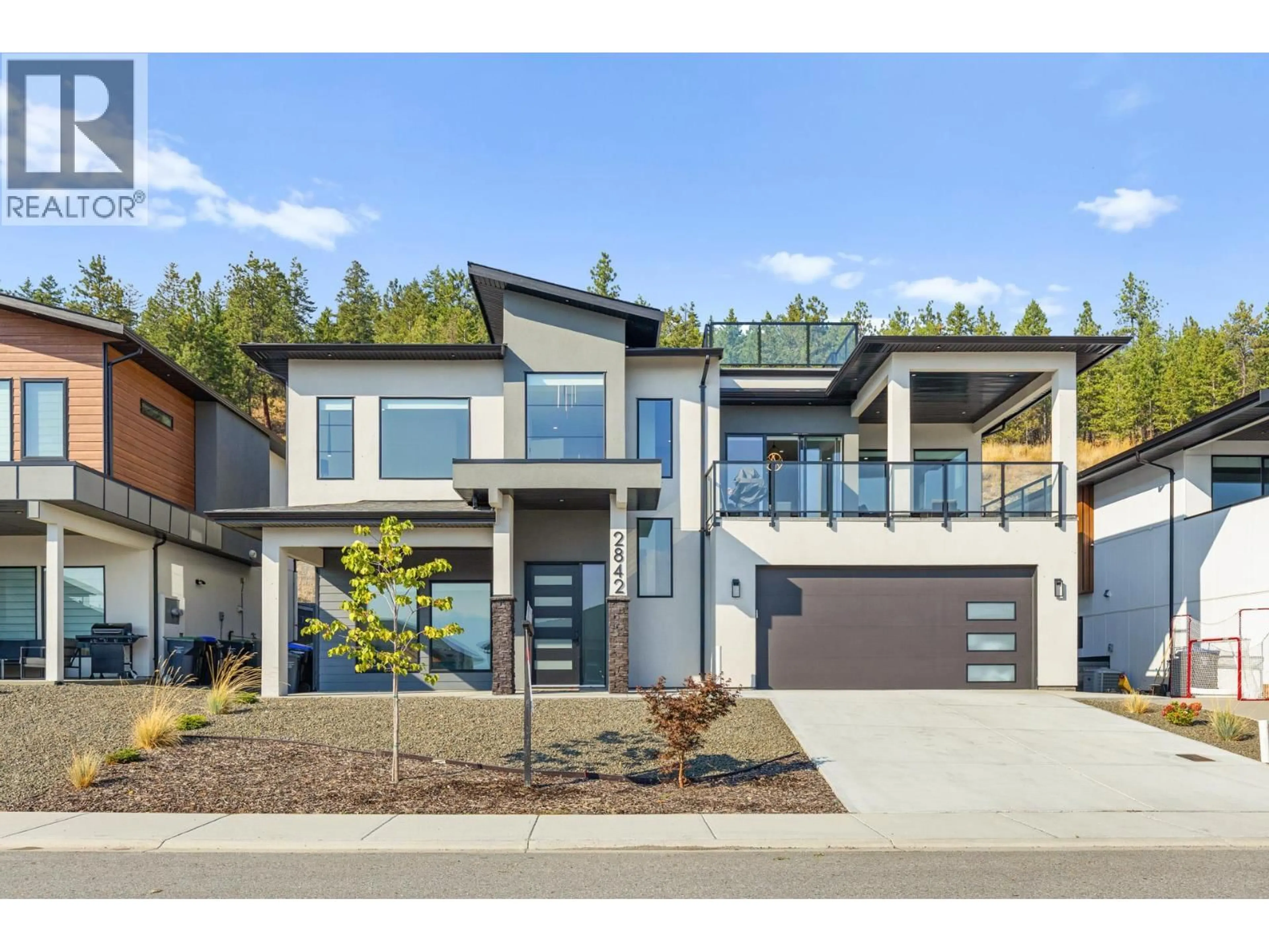 Home with vinyl exterior material, street for 2842 COPPER RIDGE DRIVE, West Kelowna British Columbia V4T0E7